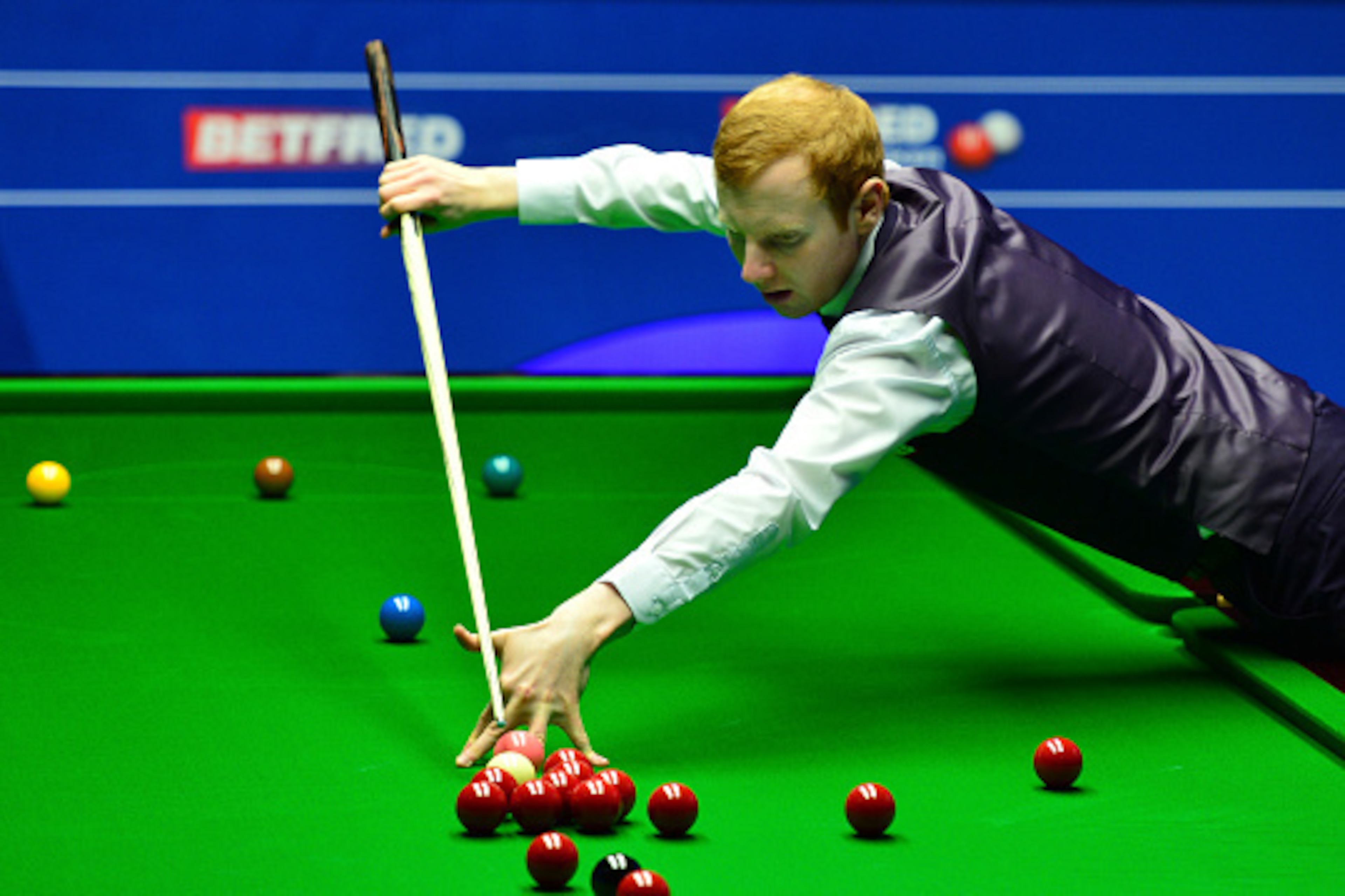 SHEFFIELD, ENGLAND - APRIL 21:  Anthony McGill of Scotland plays a shot during his second round match against Marco Fu of Hong Kong on day six of the World Snooker Championship at The Crucible Theatre on April 21, 2016 in Sheffield, England.  (Photo by Da
