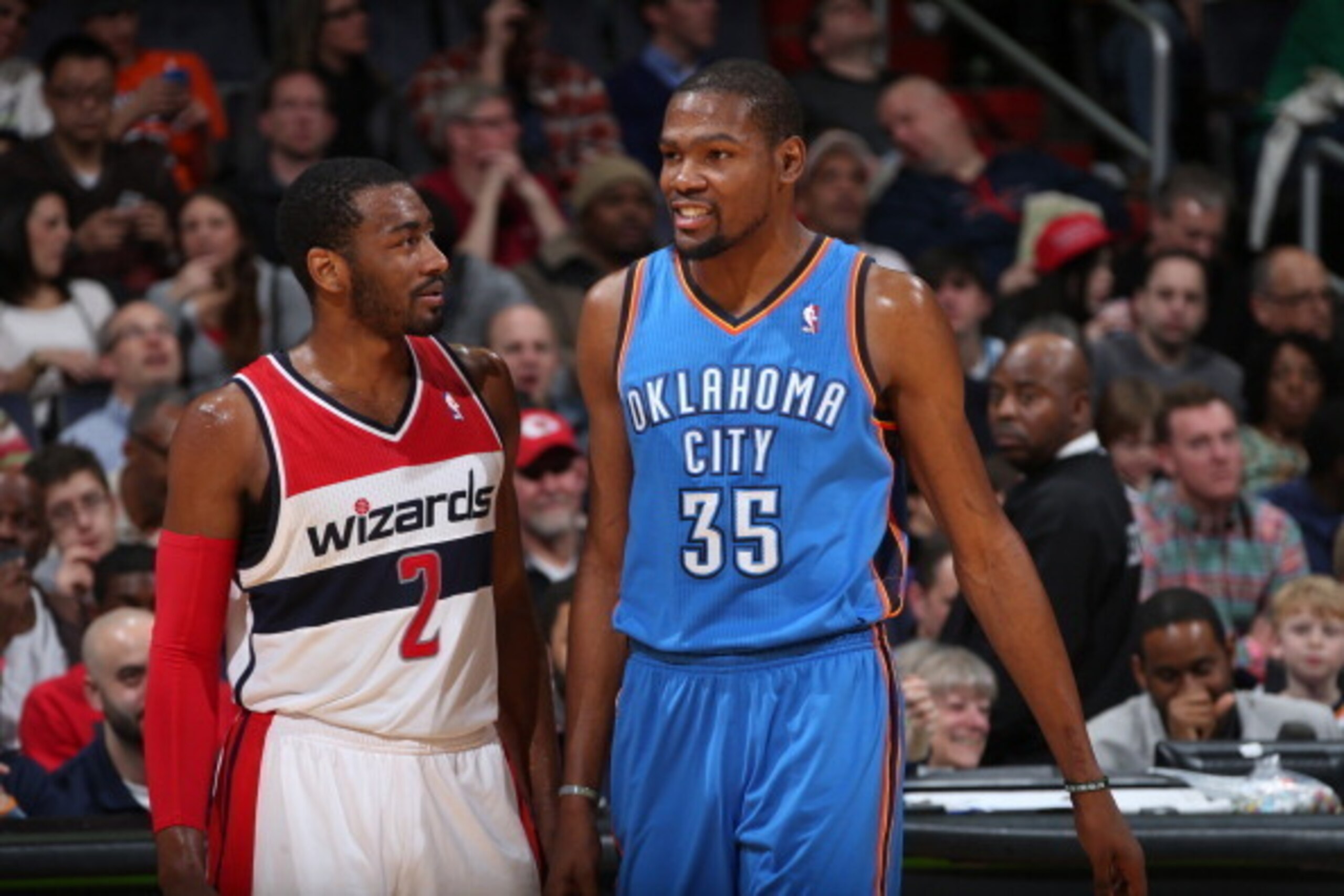 WASHINGTON, DC - FEBRUARY 2: John Wall #2 of the Washington Wizards talks with Kevin Durant #35 of the Oklahoma City Thunder during the game at the Verizon Center on February 2, 2014 in Washington, DC. NOTE TO USER: User expressly acknowledges and agrees WASHINGTON, DC - FEBRUARY 2: John Wall #2 of the Washington Wizards talks with Kevin Durant #35 of the Oklahoma City Thunder during the game at the Verizon Center on February 2, 2014 in Washington, DC. NOTE TO USER: User expressly acknowledges and agrees