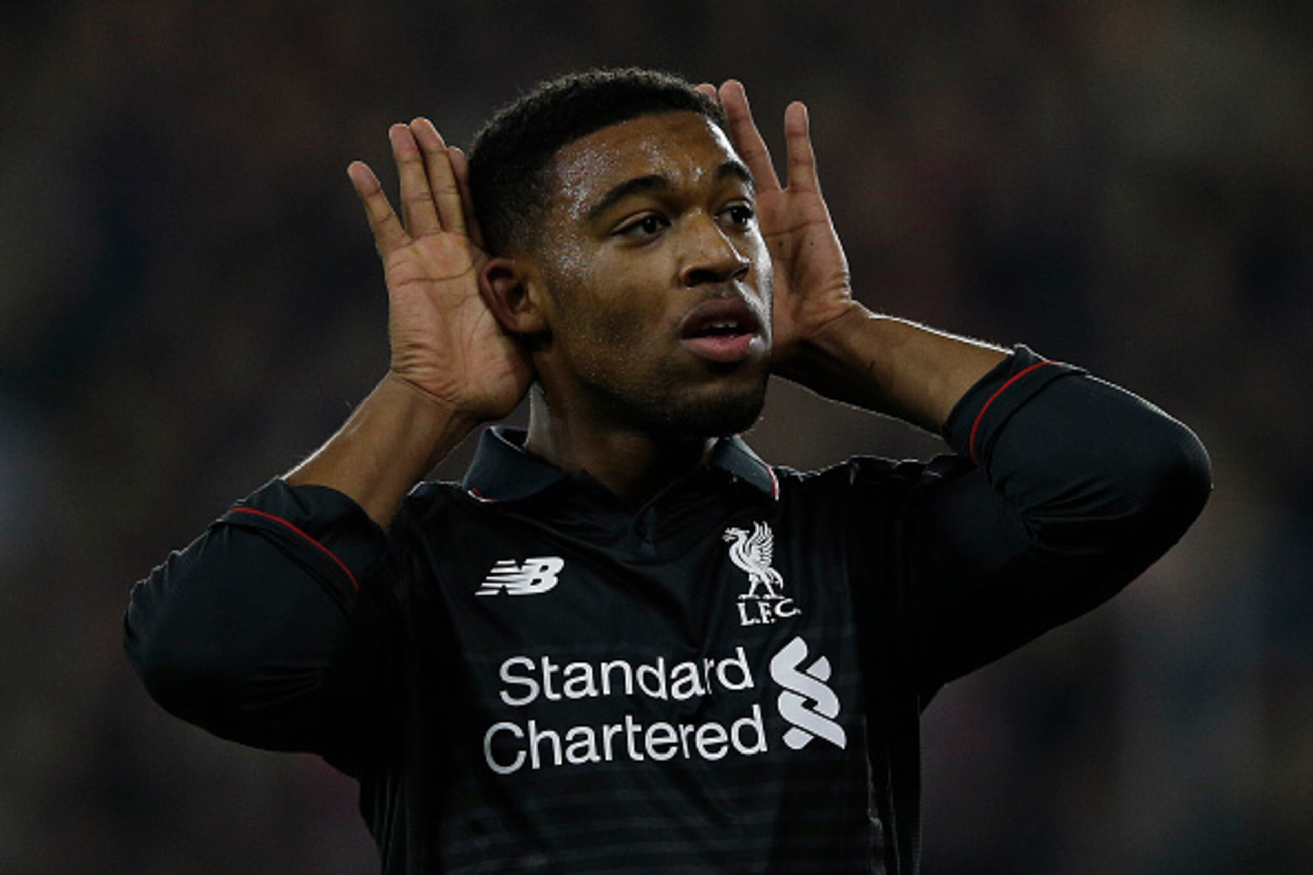 Liverpool's English midfielder Jordon Ibe celebrates scoring his team's fifth goal during the English League Cup quarter-final football match between Southampton and Liverpool at St Mary's Stadium in Southampton, southern England on December 2, 2015.   AF