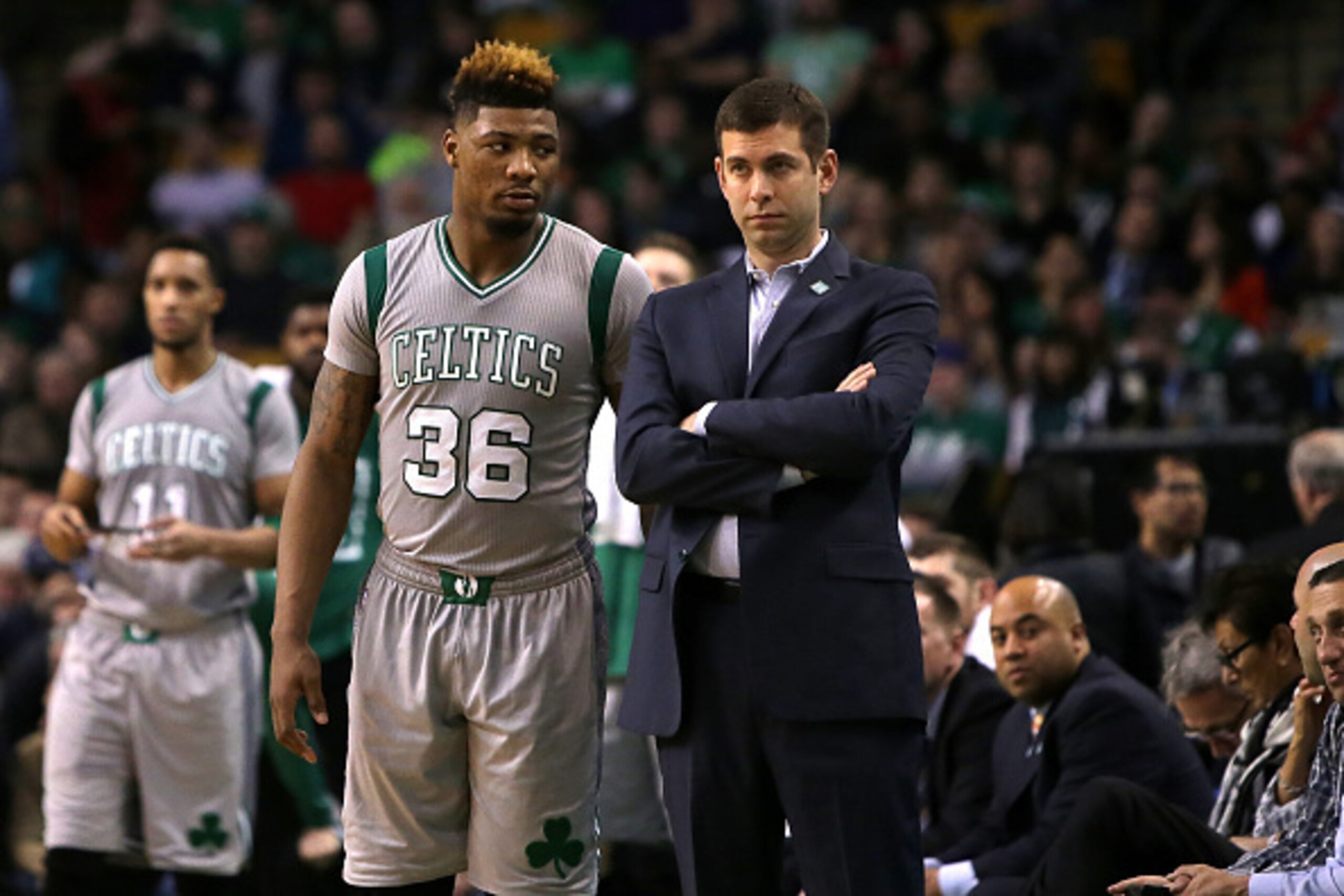 BOSTON, MA - APRIL 13: Marcus Smart #36 and head coach Brad Stevens of the Boston Celtics look on in the second quarter against the Miami Heat at TD Garden on April 13, 2016 in Boston, Massachusetts. NOTE TO USER: User expressly acknowledges and agrees th