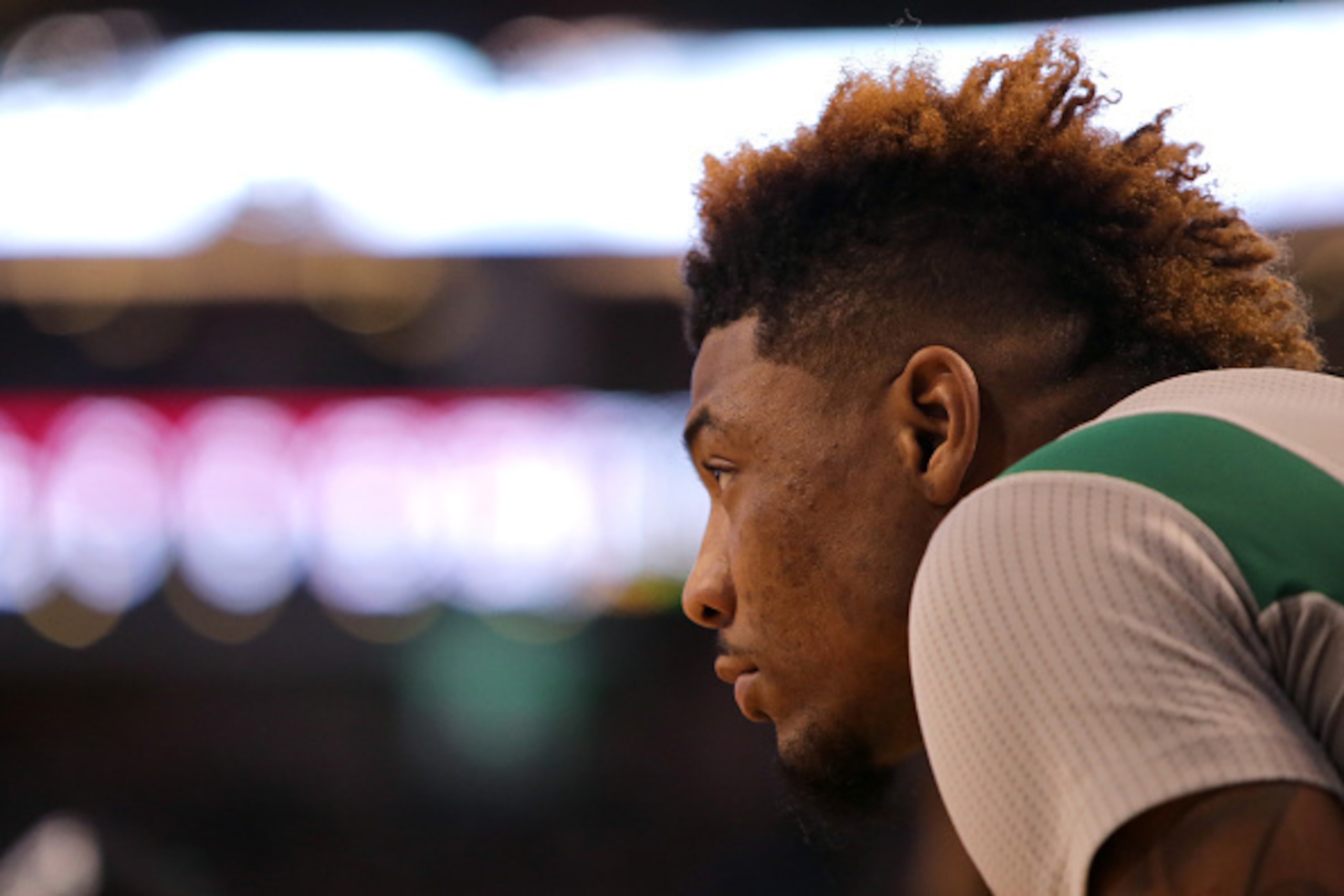 BOSTON, MA - APRIL 13:  Marcus Smart #36 of the Boston Celtics looks on in the third quarter against the Miami Heat at TD Garden on April 13, 2016 in Boston, Massachusetts. NOTE TO USER: User expressly acknowledges and agrees that, by downloading and/or u