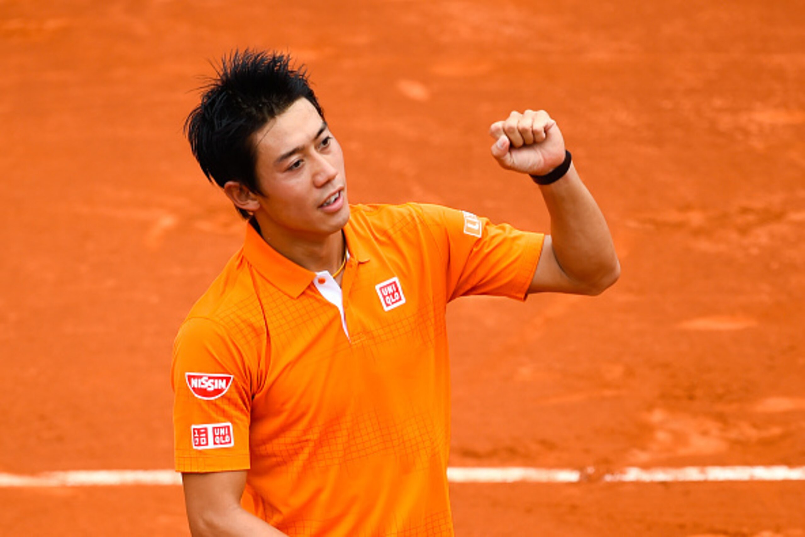 BARCELONA, SPAIN - APRIL 22:  Kei Nishikori of Japan celebrates defeating Alexandr Dolgopolov of Ukraine during day five of the Barcelona Open Banc Sabadell at the Real Club de Tenis Barcelona on April 22, 2016 in Barcelona, Spain. Nishikori won 5-7, 0-6.