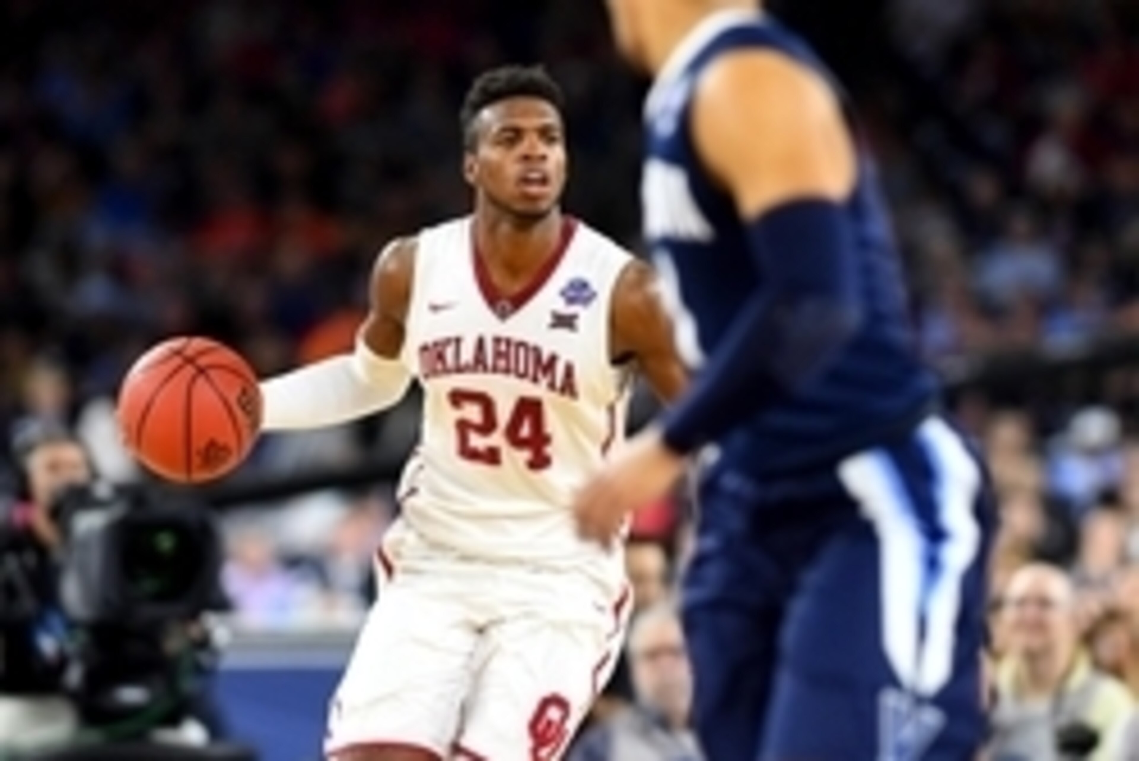 Apr 2, 2016; Houston, TX, USA; Oklahoma Sooners guard Buddy Hield (24) handles the ball during the second half against the Villanova Wildcats in the 2016 NCAA Men's Division I Championship semi-final game at NRG Stadium. Mandatory Credit: Bob Donnan-USA T