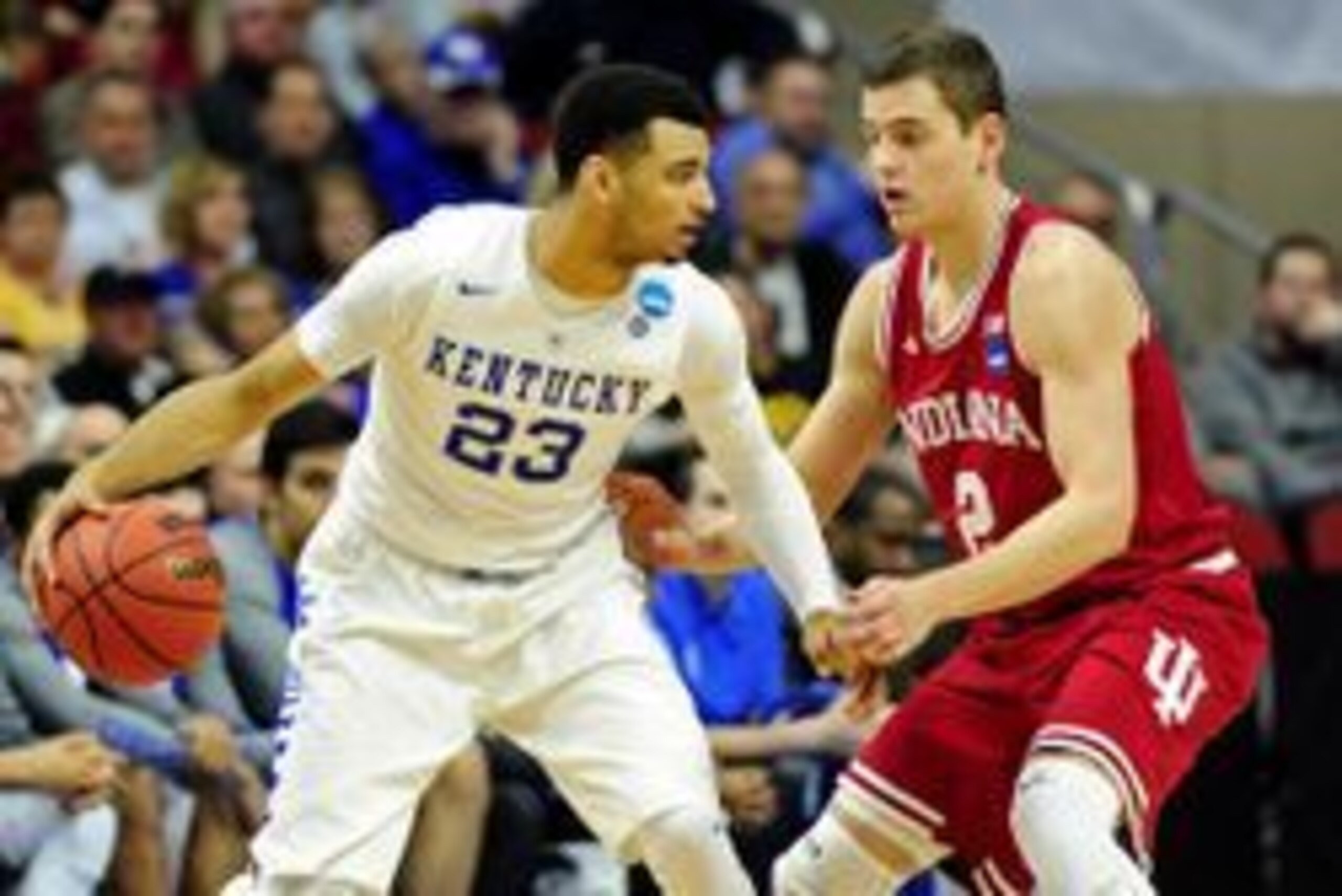 Mar 19, 2016; Des Moines, IA, USA; Kentucky Wildcats guard Jamal Murray (23) handles the ball against Indiana Hoosiers guard Nick Zeisloft (2) in the second half during the second round of the 2016 NCAA Tournament at Wells Fargo Arena. Mandatory Credit: J