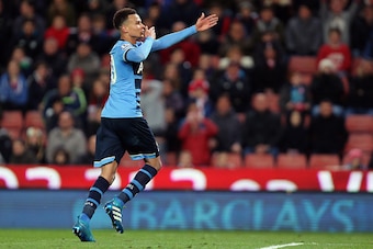 STOKE ON TRENT, ENGLAND - APRIL 18: Dele Alli of Tottenham Hotspur celebrates after scoring a goal to make it 0-2 during the Barclays Premier League match between Stoke City and Tottenham Hotspur at Britannia Stadium on April 18, 2016 in Stoke on Trent, E