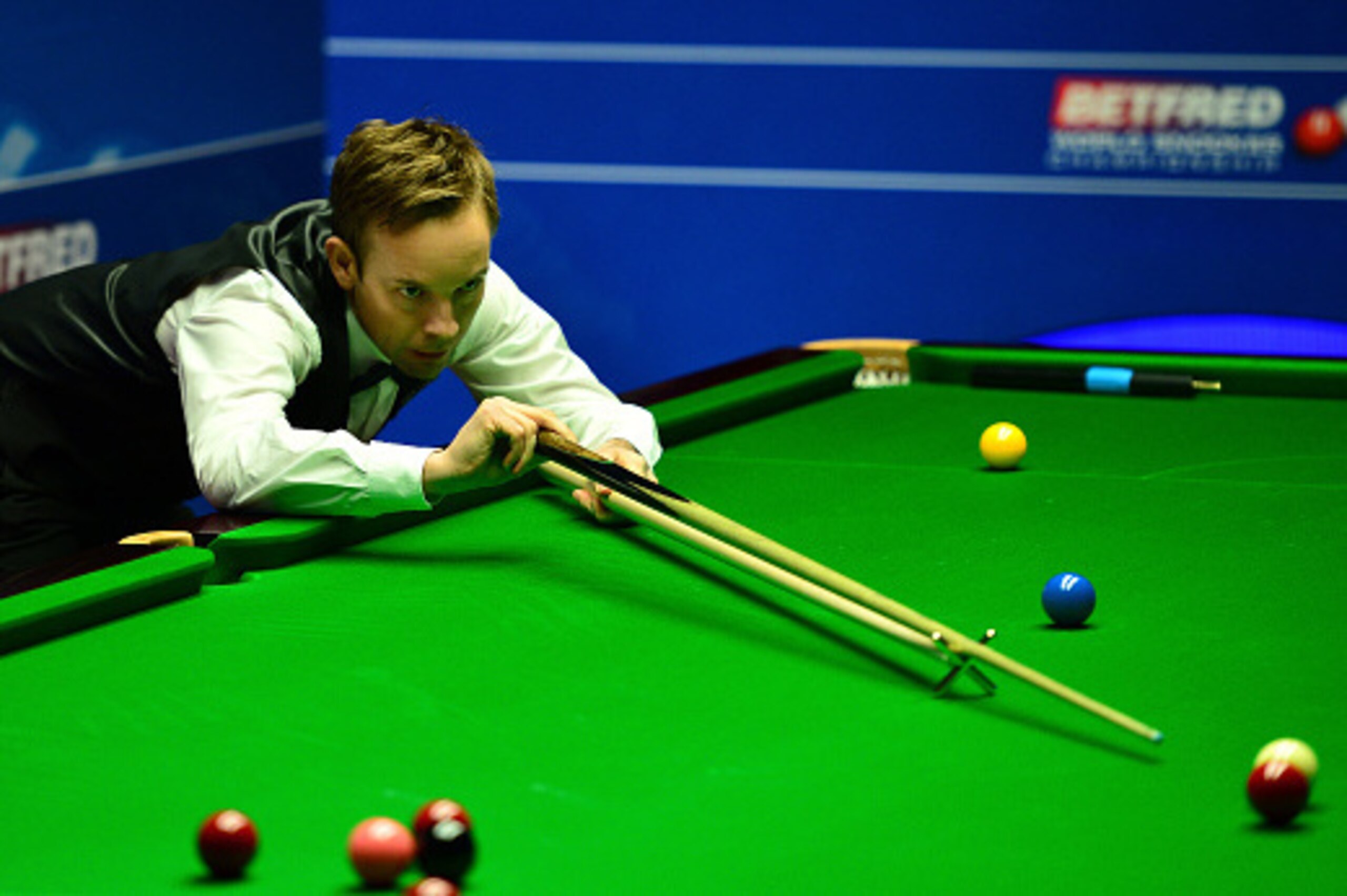 SHEFFIELD, ENGLAND - APRIL 22:  Ali Carter of England plays a shot during his second round match against Alan McManus of Scotland on day seven of the World Snooker Championship at The Crucible Theatre on April 22, 2016 in Sheffield, England.  (Photo by Da