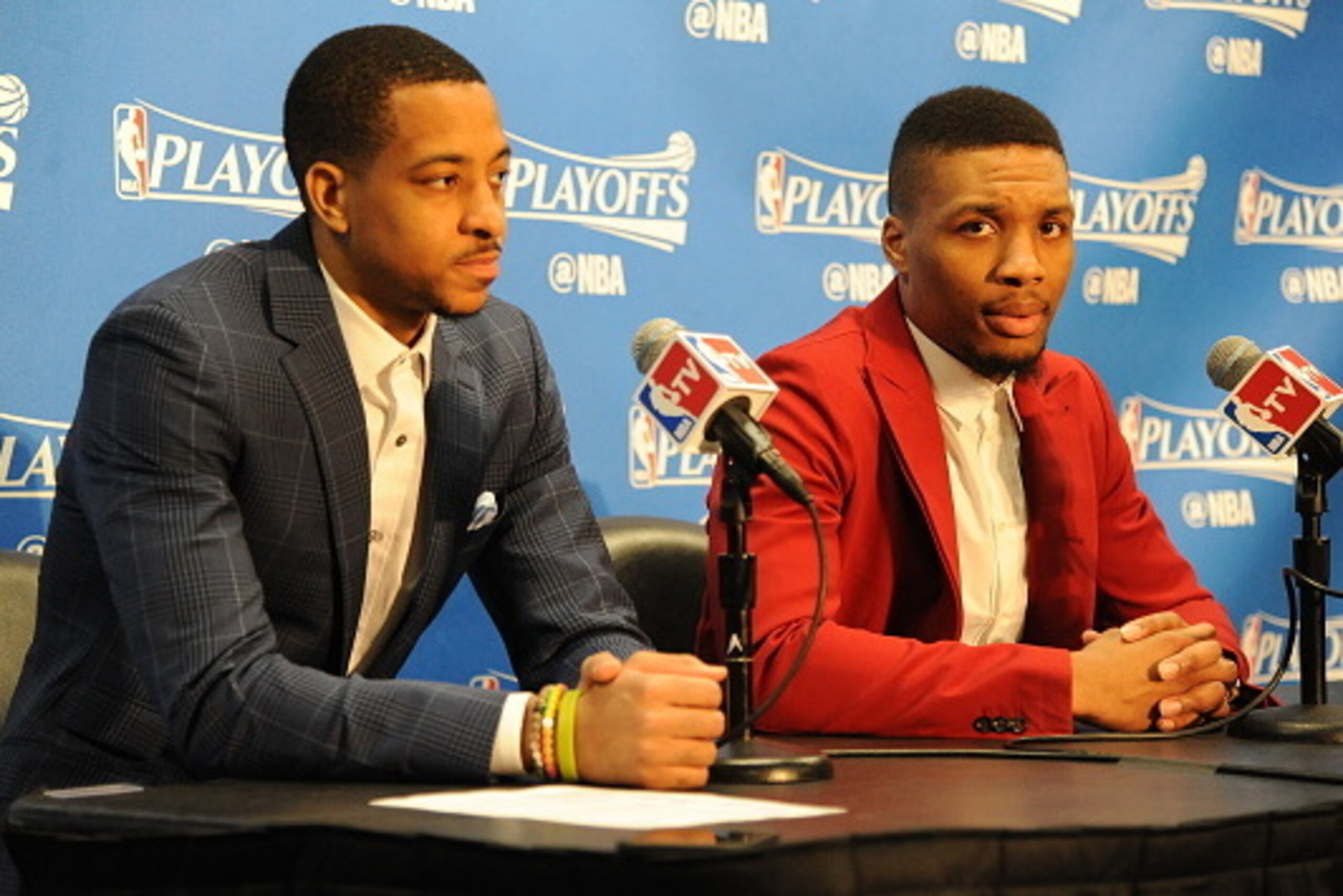 LOS ANGELES, CA - APRIL 20:  C.J. McCollum #3 of the Portland Trail Blazers and Damian Lillard #0 talk to the media after the game against the Los Angeles Clippers in Game Two of the Western Conference Quarterfinals during the 2016 NBA Playoffs at STAPLES