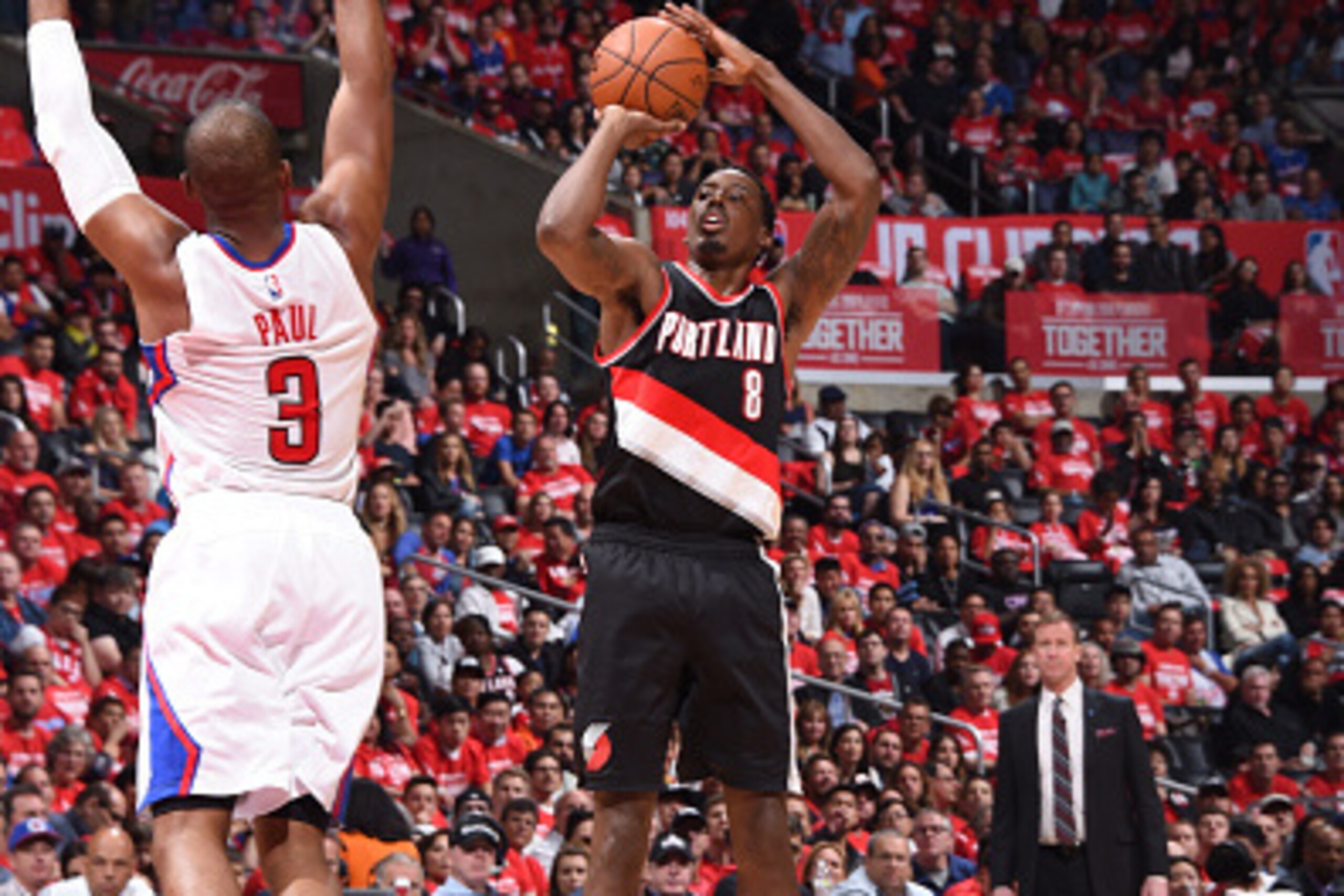 LOS ANGELES, CA - APRIL 17:  Al-Farouq Aminu #8 of the Portland Trail Blazers shoots against Chris Paul #3 of the Los Angeles Clippers in Game One of the Western Conference Quarterfinals during the 2016 NBA Playoffs on April 17, 2016 at STAPLES Center in 