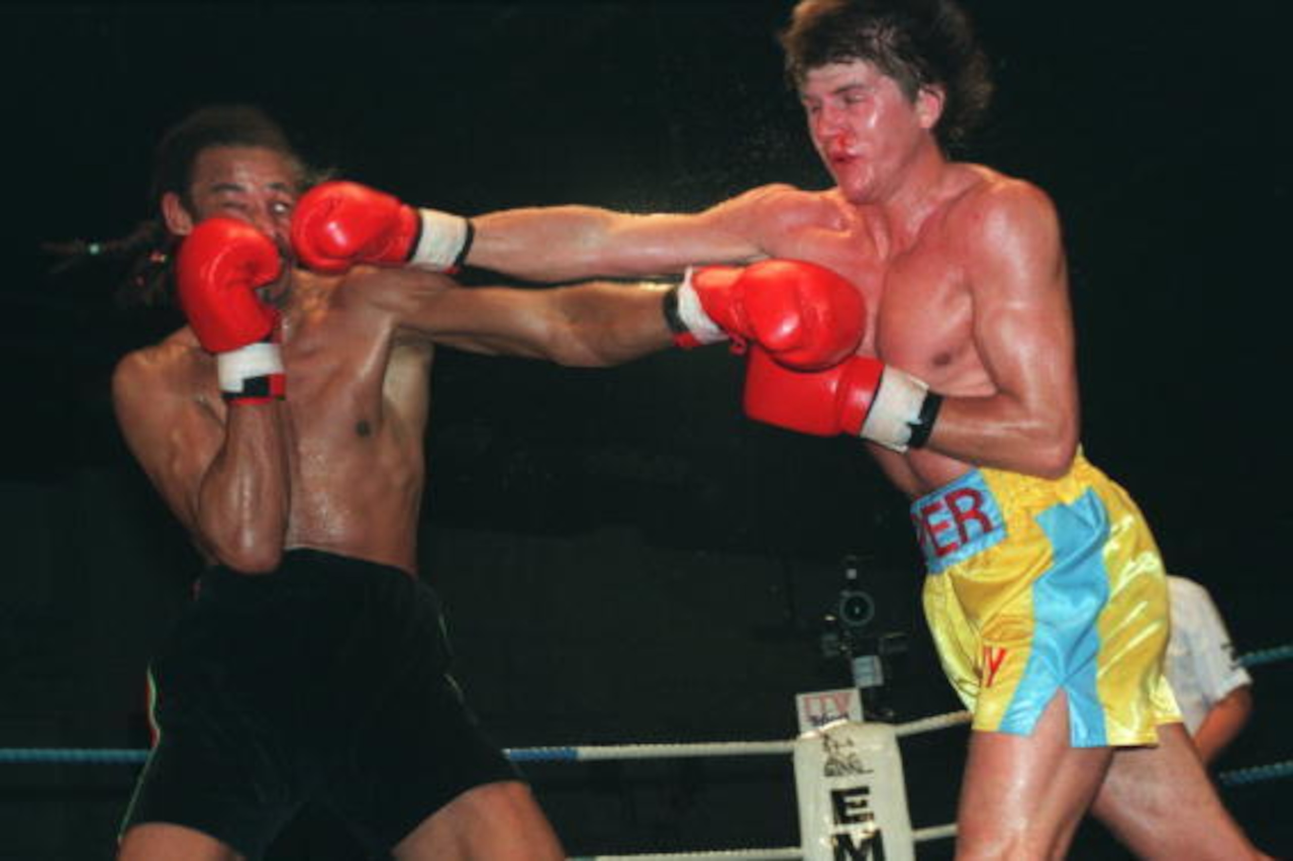 19 NOV 1994: NICKY PIPER OF WALES CONNECTS WITH A RIGHT HAND PUNCH TO THE FACE OF CRAWFORD ASHLEY OF ENGLAND DURING THEIR LIGHT HEAVYWEIGHT FIGHT IN CARDIFF. ASHLEY WENT ON TO WIN THE FIGHT. Mandatory Credit: John Gichigi/ALLSPORT 19 NOV 1994: NICKY PIPER OF WALES CONNECTS WITH A RIGHT HAND PUNCH TO THE FACE OF CRAWFORD ASHLEY OF ENGLAND DURING THEIR LIGHT HEAVYWEIGHT FIGHT IN CARDIFF. ASHLEY WENT ON TO WIN THE FIGHT. Mandatory Credit: John Gichigi/ALLSPORT