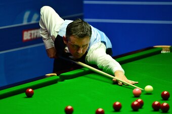 SHEFFIELD, ENGLAND - APRIL 22:  Alan McManus of Scotland plays a shot during his second round match against Ali Carter of England on day seven of the World Snooker Championship at The Crucible Theatre on April 22, 2016 in Sheffield, England.  (Photo by Da