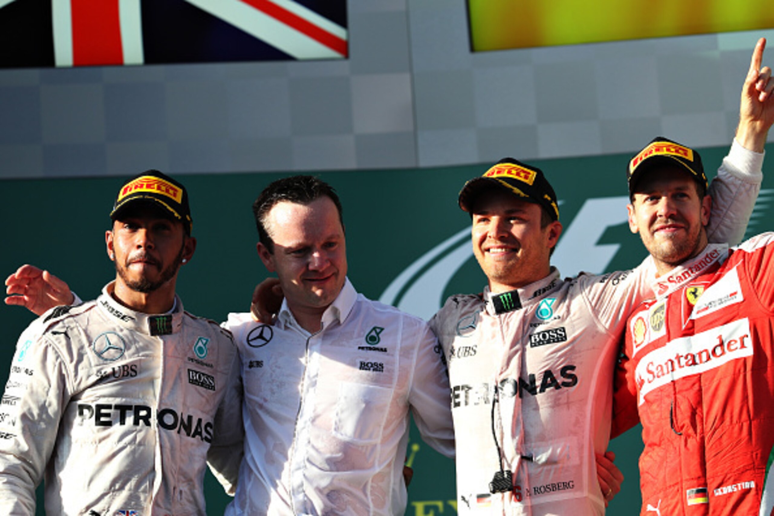 MELBOURNE, AUSTRALIA - MARCH 20: Nico Rosberg of Germany and Mercedes GP celebrates on the podium with Sebastian Vettel of Germany and Ferrari and Lewis Hamilton of Great Britain and Mercedes GP during the Australian Formula One Grand Prix at Albert Park MELBOURNE, AUSTRALIA - MARCH 20: Nico Rosberg of Germany and Mercedes GP celebrates on the podium with Sebastian Vettel of Germany and Ferrari and Lewis Hamilton of Great Britain and Mercedes GP during the Australian Formula One Grand Prix at Albert Park