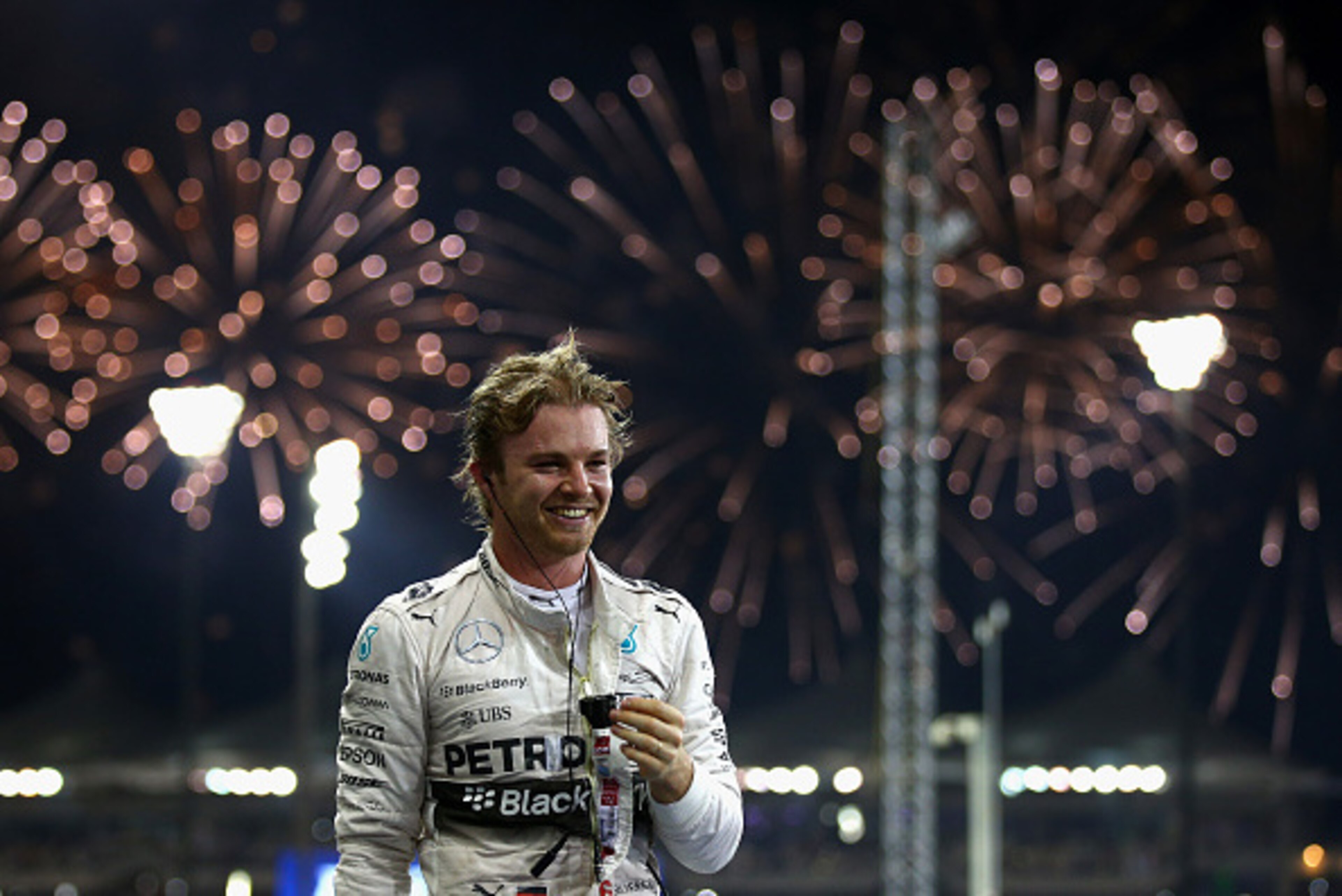 ABU DHABI, UNITED ARAB EMIRATES - NOVEMBER 29:  Nico Rosberg of Germany and Mercedes GP celebrates in Parc Ferme after winning the Abu Dhabi Formula One Grand Prix at Yas Marina Circuit on November 29, 2015 in Abu Dhabi, United Arab Emirates.  (Photo by P
