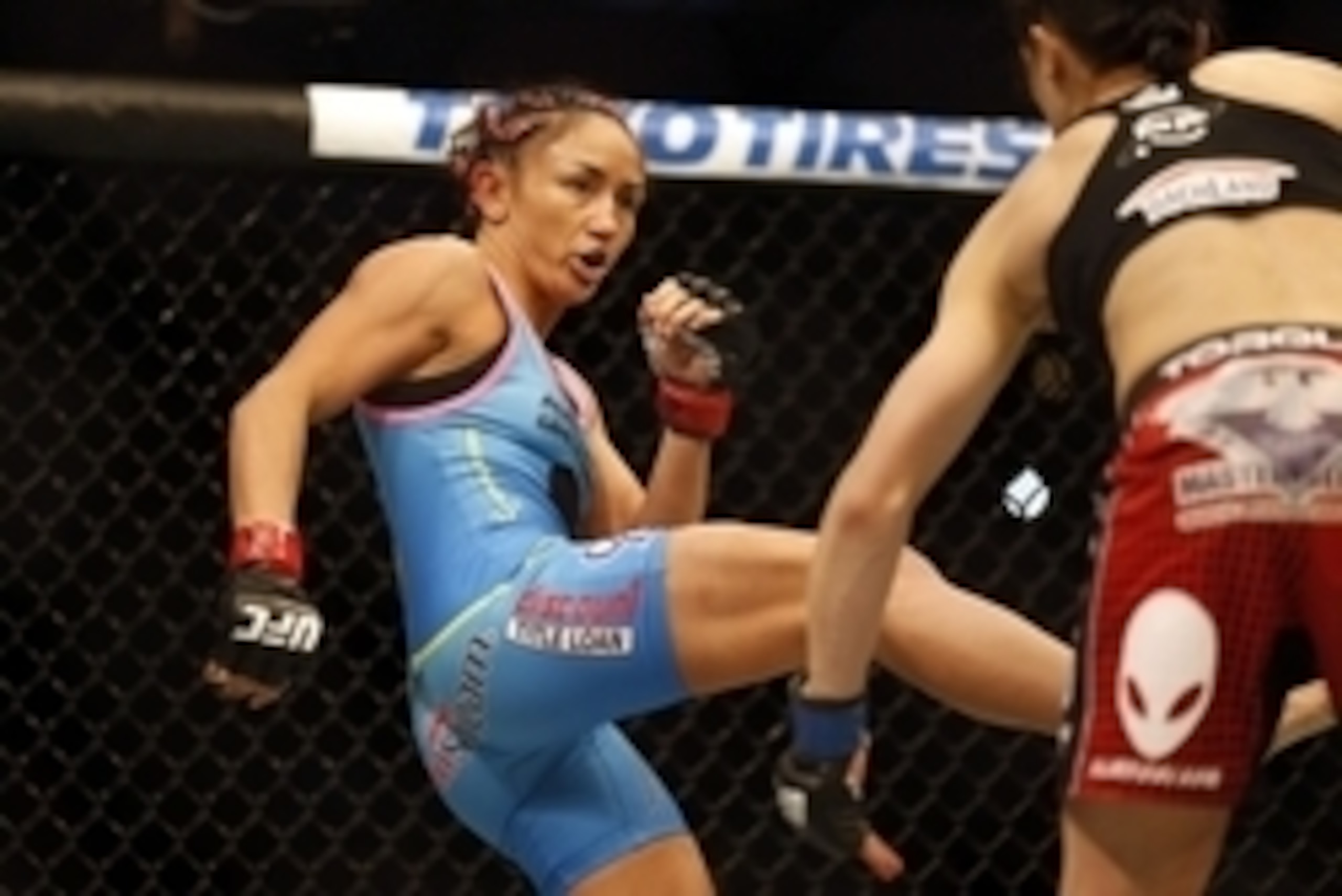 Mar 14, 2015; Dallas, TX, USA; Carla Esparza (red) fights Joanna Jedrzejczyk (blue) in the women's strawweight title bout during UFC 185 at American Airlines Center. Mandatory Credit: Tim Heitman-USA TODAY Sports Mar 14, 2015; Dallas, TX, USA; Carla Esparza (red) fights Joanna Jedrzejczyk (blue) in the women's strawweight title bout during UFC 185 at American Airlines Center. Mandatory Credit: Tim Heitman-USA TODAY Sports