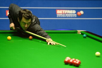 SHEFFIELD, ENGLAND - APRIL 17:  Ronnie O'Sullivan plays a shot against David Gilbert during their first round match of the 2016 Betfred World Snooker Championship at Crucible Theatre on April 17, 2016 in Sheffield, England.  (Photo by Gareth Copley/Getty 