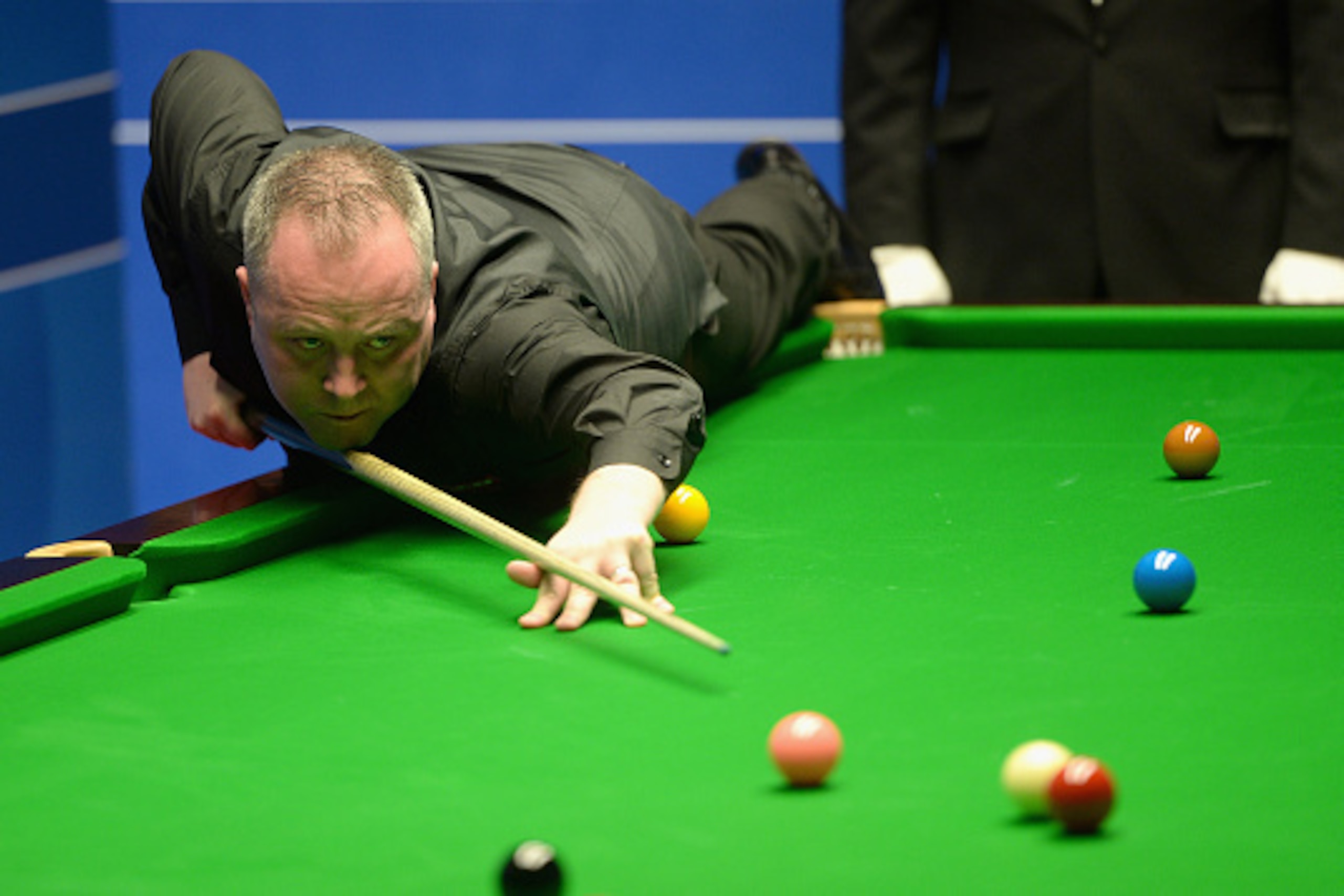 SHEFFIELD, ENGLAND - APRIL 19:  John Higgins plays a shot against Ryan Day during their first round match of the World Snooker Championship at Crucible Theatre on April 19, 2016 in Sheffield, England.  (Photo by Gareth Copley/Getty Images)