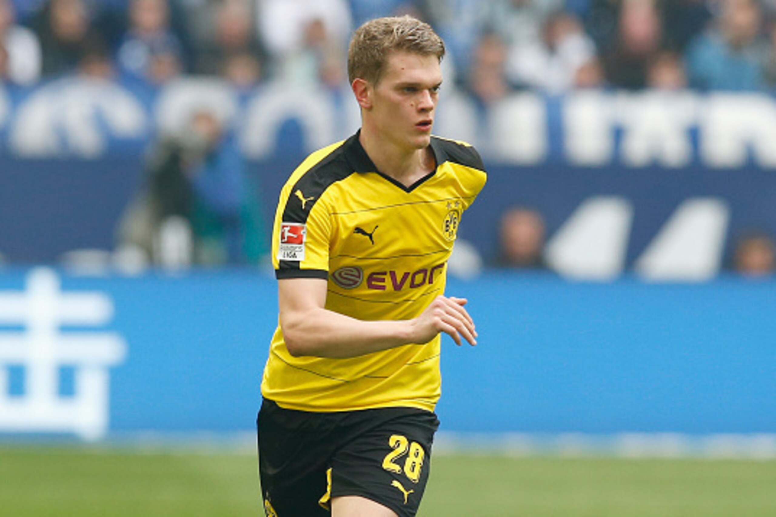 GELSENKIRCHEN, NORTH RHINE-WESTPHALIA - APRIL 10:  Matthias Ginter of Borussia Dortmund runs with the ball during the Bundesliga match between FC Schalke 04 and Borussia Dortmund at Veltins-Arena on April 10, 2016 in Gelsenkirchen, Germany.  (Photo by Bor