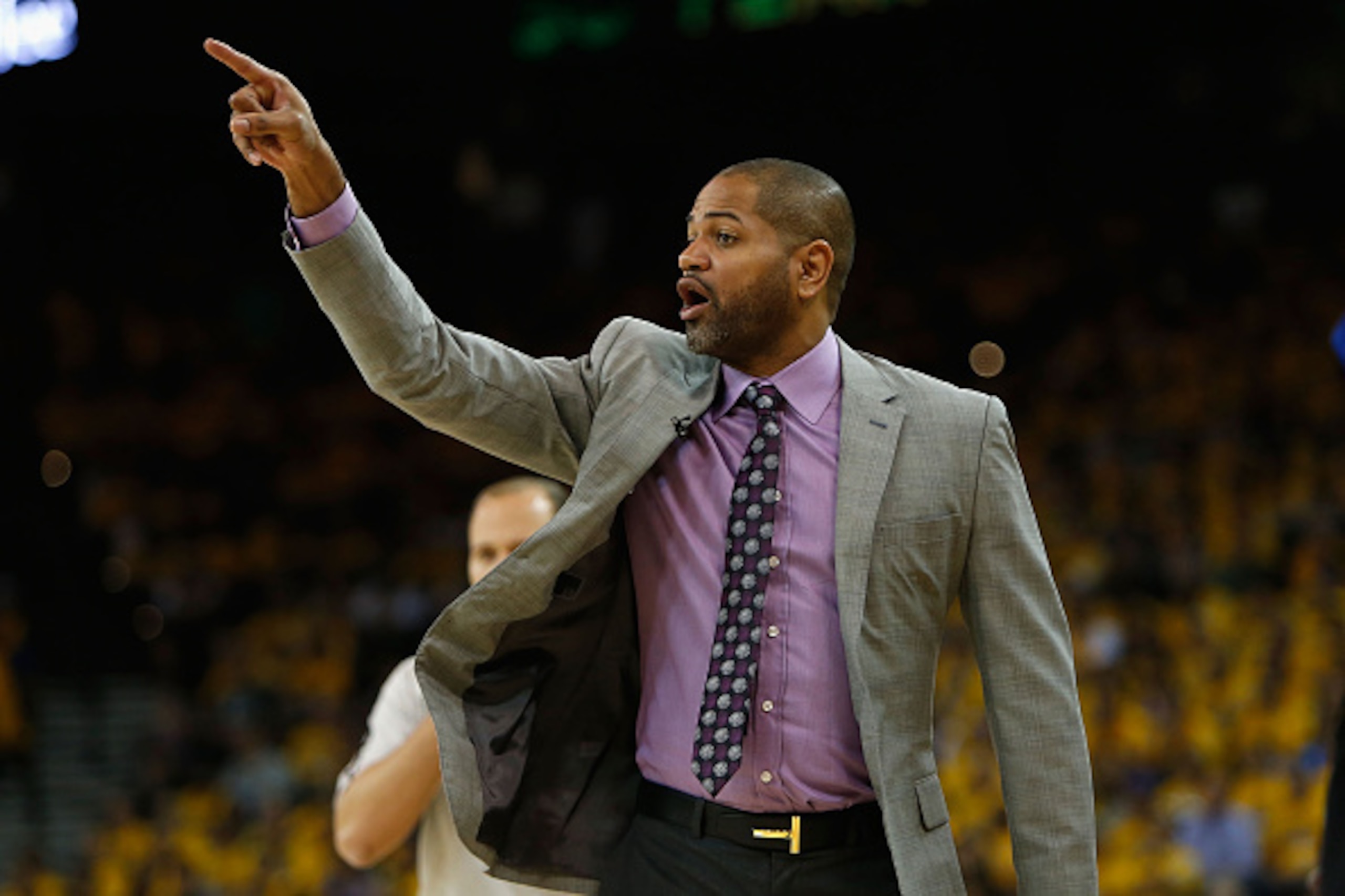 OAKLAND, CA - APRIL 18: Head Coach of the Houston Rockets J.B. Bickerstaff gives directions in the second quarter in Game Two of the Western Conference Quarterfinals during the 2016 NBA Playoffs at ORACLE Arena on April 18, 2016 in Oakland, California. NO