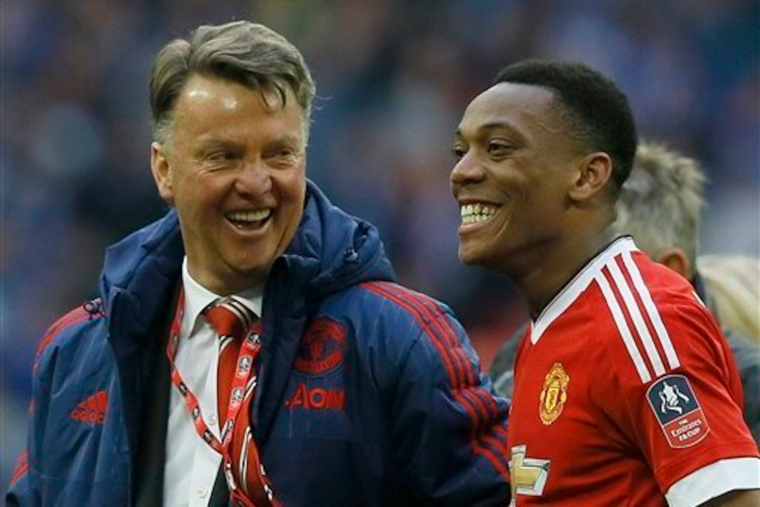 Van Gaal and Martial share a moment of joyous celebration after the semi-final. Van Gaal and Martial share a moment of joyous celebration after the semi-final.