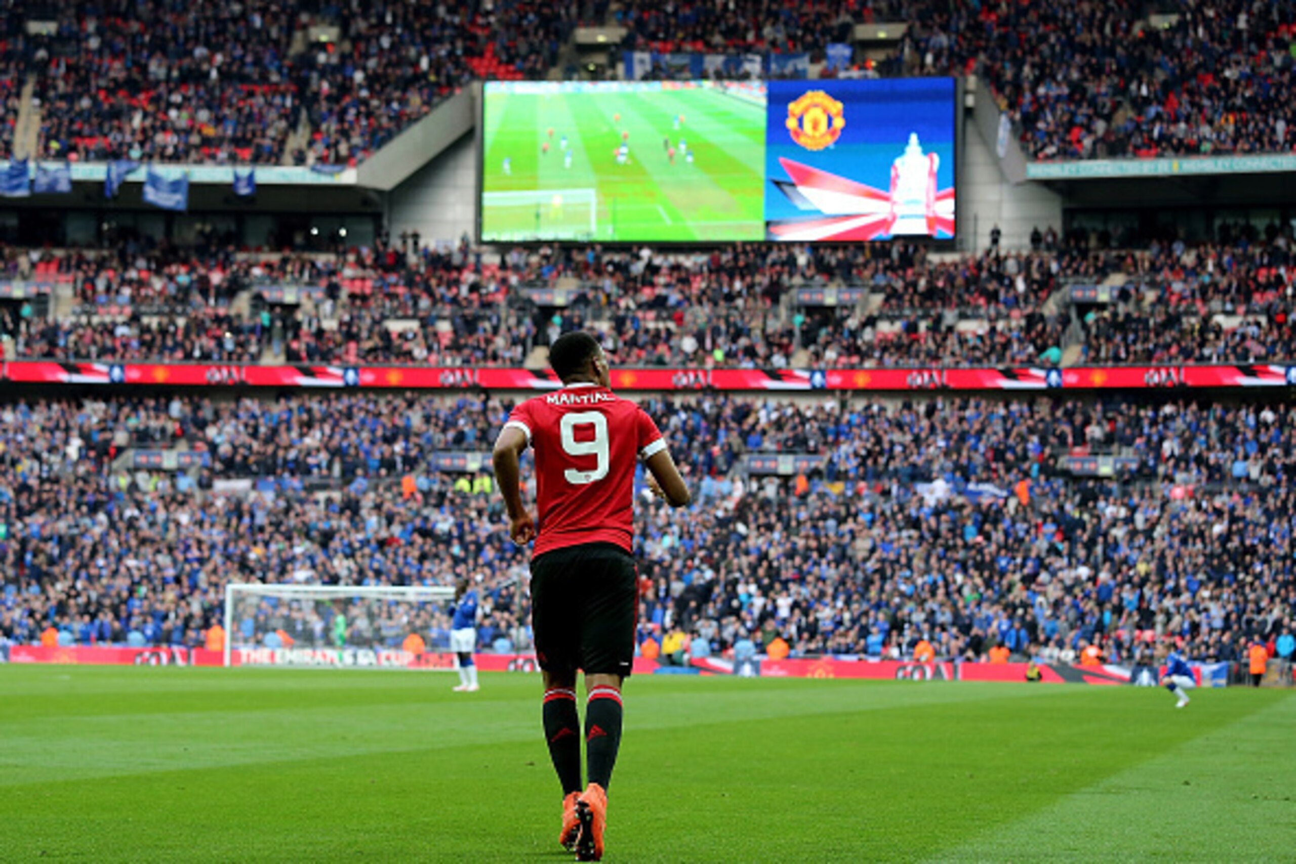 LONDON, ENGLAND - APRIL 23: Anthony Martial of Manchester United heads to the centre circle after scoring the winning goal to make the score 1-2 during the Emirates FA Cup Semi Final match between Everton and Manchester United at Wembley Stadium on April LONDON, ENGLAND - APRIL 23: Anthony Martial of Manchester United heads to the centre circle after scoring the winning goal to make the score 1-2 during the Emirates FA Cup Semi Final match between Everton and Manchester United at Wembley Stadium on April