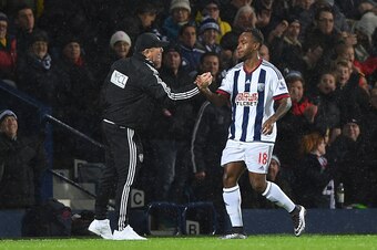 WEST BROMWICH, ENGLAND - JANUARY 09:  Saido Berahino of West Bromwich Albion shakes hands with manager Tony Pulis after scoring his team's first goal during the Emirates FA Cup Third Round match between West Bromwich Albion and Bristol City at The Hawthor