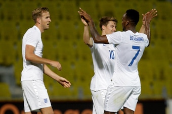TIRASPOL, MOLDOVA - SEPTEMBER 9:  Harry Kane, Saido Berahino and Thomas Carrol of England celebrating after the third goal during the Moldova v England UEFA U21 Championship Qualifier 2015 match at Stadionul Sheriff on September 9, 2014 in Tiraspol, Moldo