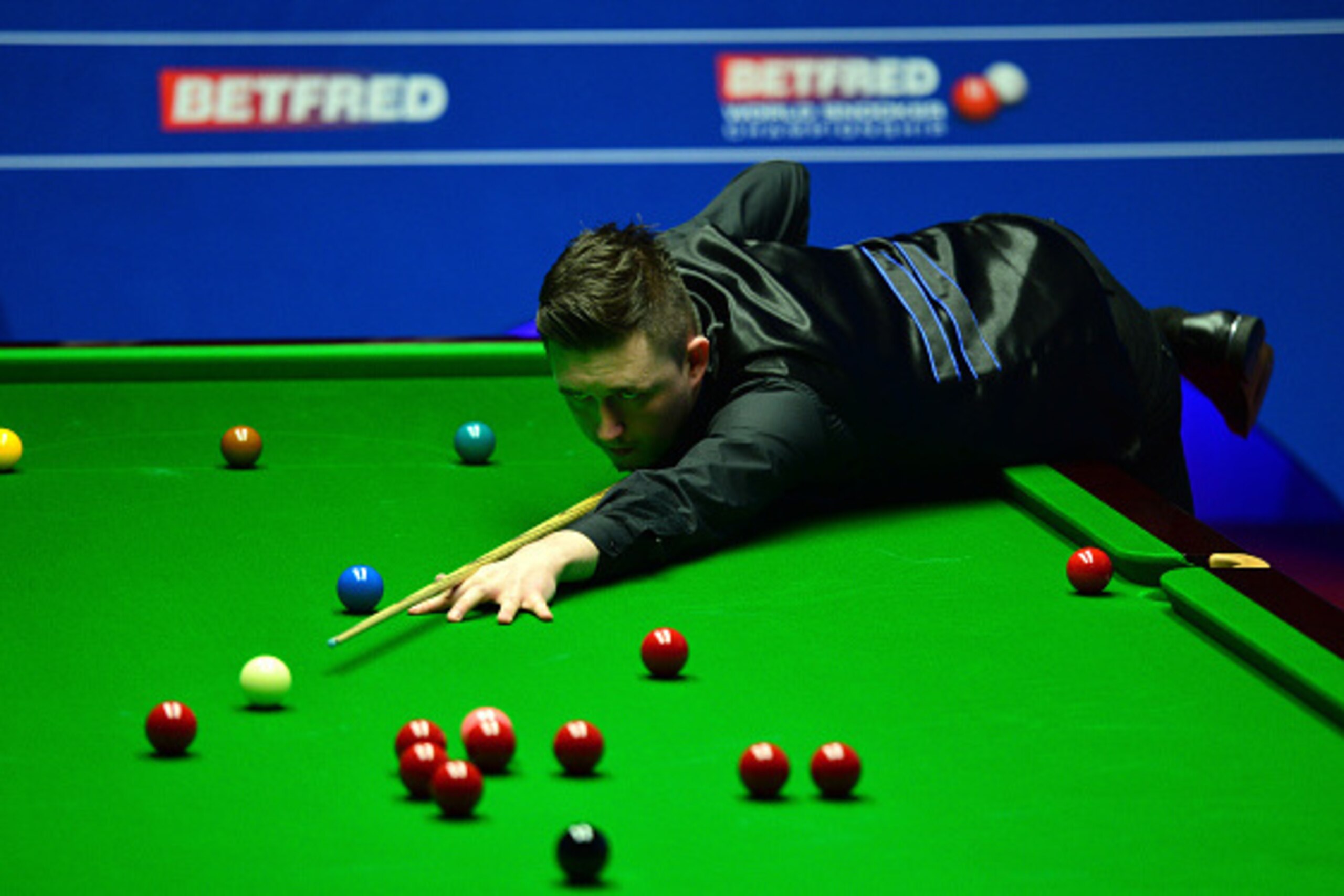 SHEFFIELD, ENGLAND - APRIL 20: Kyren Wilson of England plays a shot during his first round match against Joe Perry of England on day 5 of the World Snooker Championship at The Crucible Theatre on April 20, 2016 in Sheffield, England. (Photo by Dan Mulla SHEFFIELD, ENGLAND - APRIL 20: Kyren Wilson of England plays a shot during his first round match against Joe Perry of England on day 5 of the World Snooker Championship at The Crucible Theatre on April 20, 2016 in Sheffield, England. (Photo by Dan Mulla