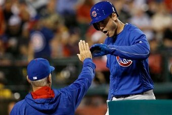 Rizzo and skipper Joe Maddon each provide leadership to a young Cubs team.