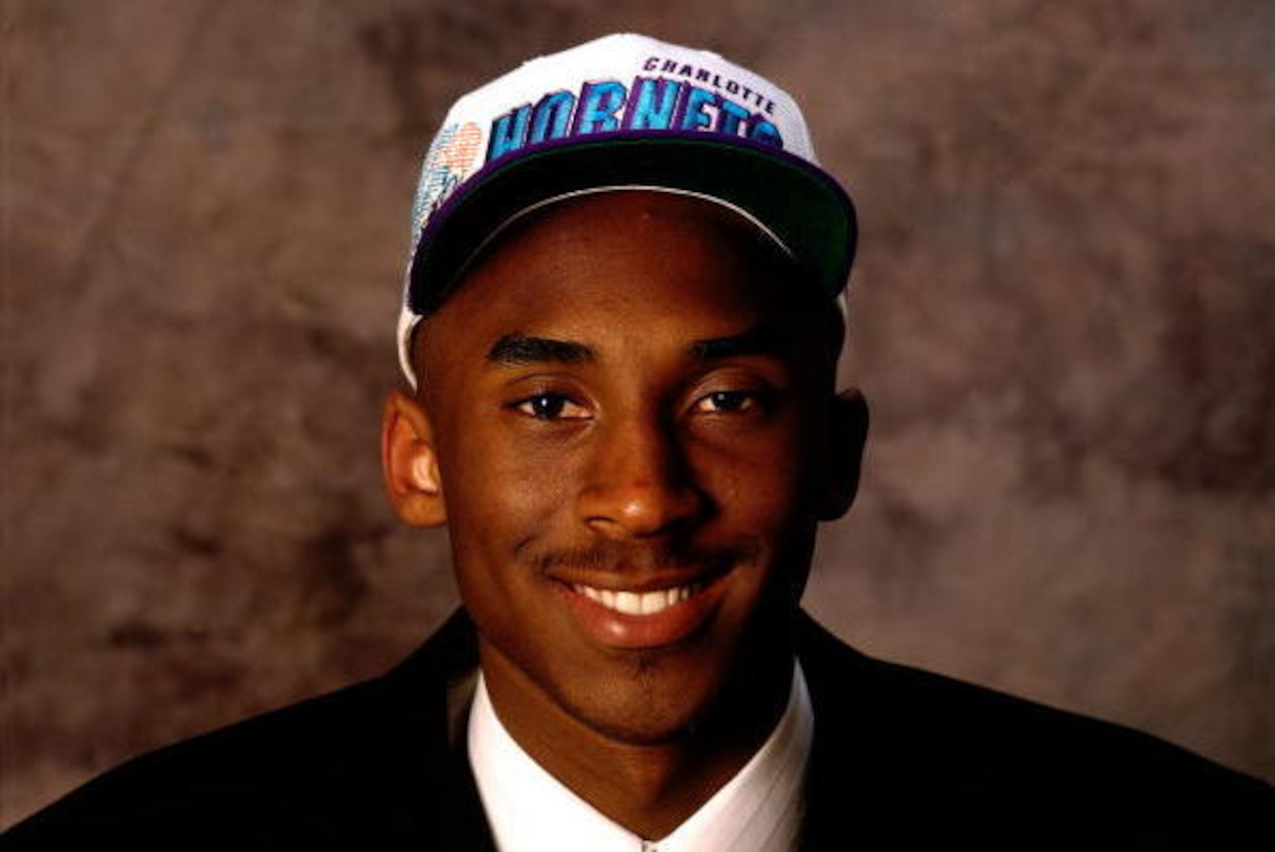 NEW YORK - 1996:  First Round NBA draft pick Kobe Bryant poses for a photo.  NOTE TO USER: User expressly acknowledges that, by downloading and or using this photograph, User is consenting to the terms and conditions of the Getty Images License agreement.