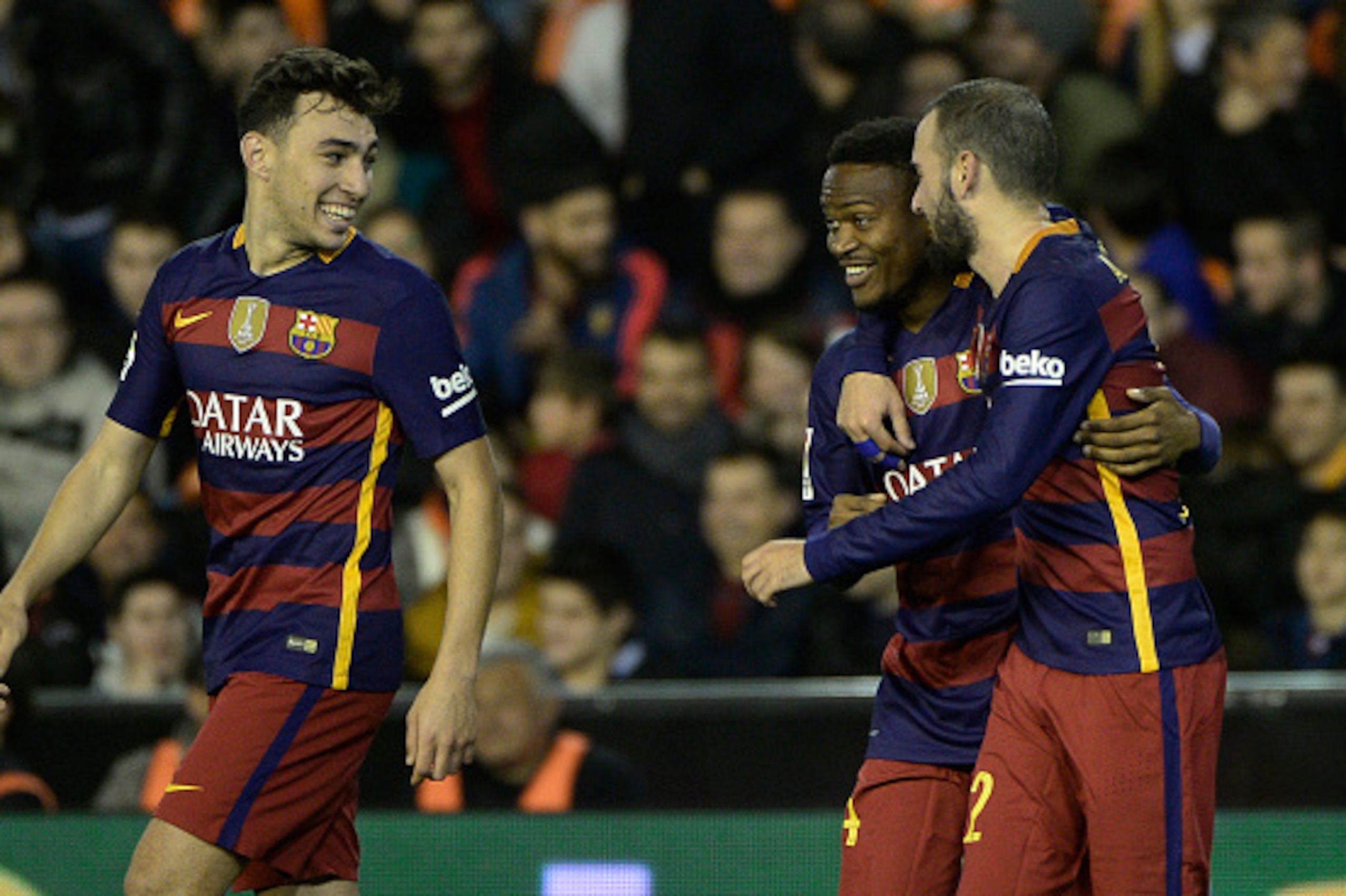 Barcelona's Cameroonian forward Wilfrid Kaptoum (C) celebrates his goal with Barcelona's defender Vidal Aleix and Barcelona's forward Munir El Haddadi (L) during Spanish Copa del Rey (King's Cup) semifinal second leg match Valencia CF vs FC Barcelona at Barcelona's Cameroonian forward Wilfrid Kaptoum (C) celebrates his goal with Barcelona's defender Vidal Aleix and Barcelona's forward Munir El Haddadi (L) during Spanish Copa del Rey (King's Cup) semifinal second leg match Valencia CF vs FC Barcelona at