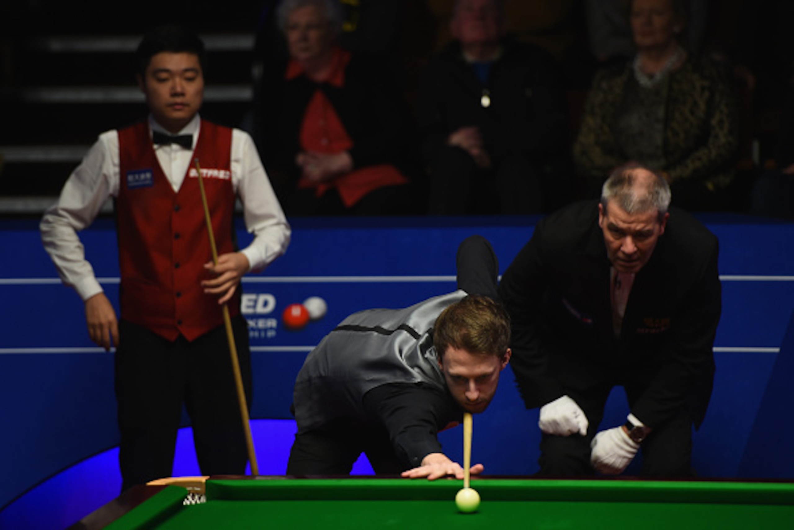 SHEFFIELD, ENGLAND - APRIL 25: Judd Trump of England in action during his second round match against  Ding Junhui of China on day ten of the World Snooker Championship at Crucible Theatre on April 25, 2016 in Sheffield, England.  (Photo by Laurence Griffi