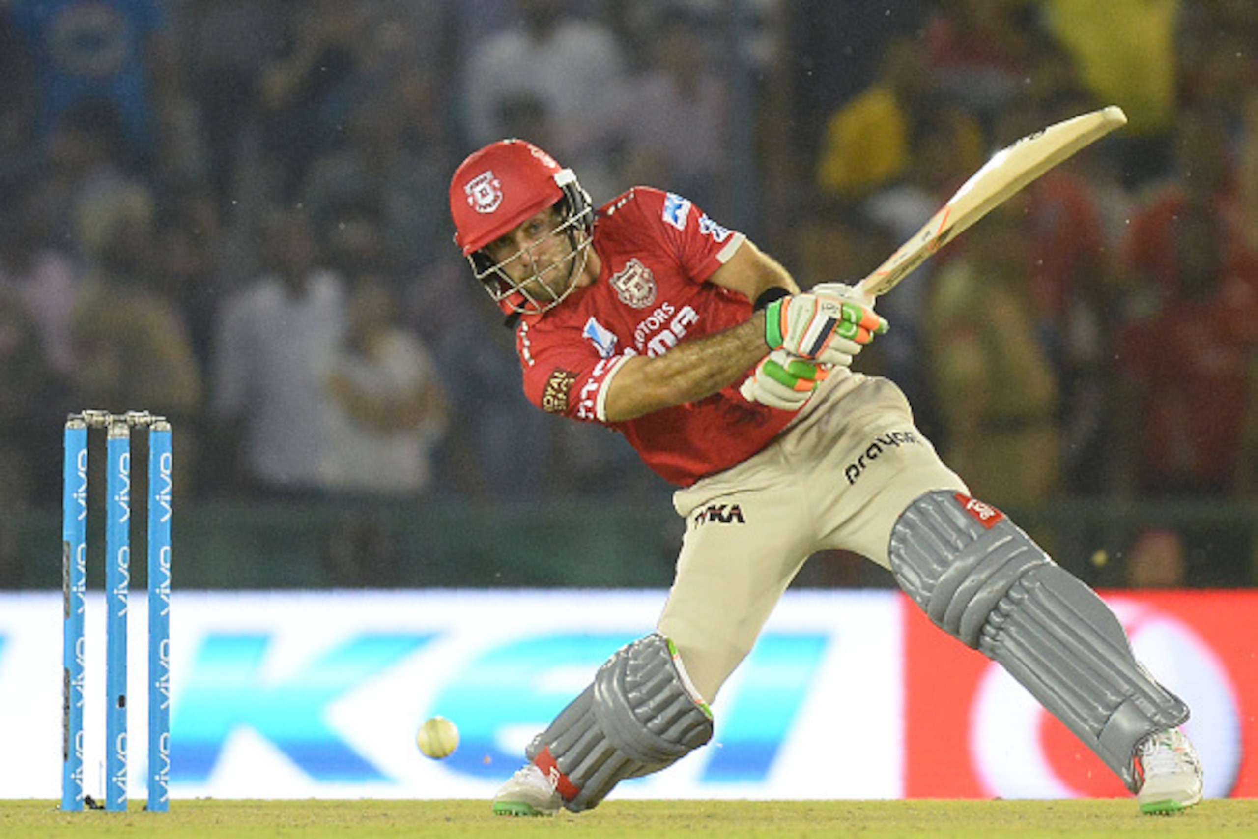 Kings XI Punjab  Glenn Maxwell (R)  plays a shot during the 2016 Indian Premier League (IPL) Twenty20 cricket match between Rising Pune Supergiants and Kings XI Punjab at The Punjab Cricket Association Stadium in Mohali on April 17, 2016  ------IMAGE REST