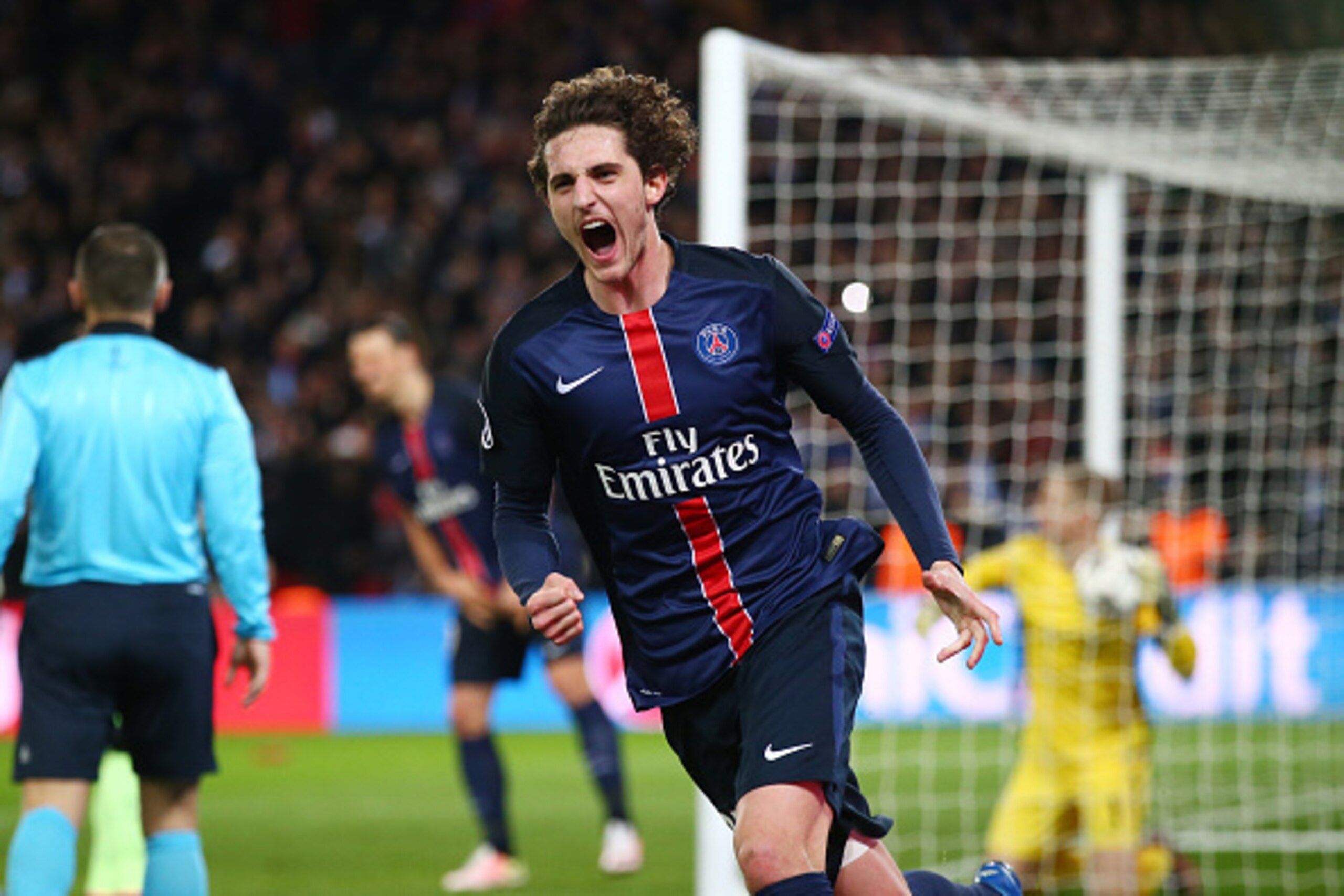 PARIS, FRANCE - APRIL 06:  Adrien Rabiot of Paris Saint-Germain celebrates scoring his team's second goal during the UEFA Champions League Quarter Final First Leg match between Paris Saint-Germain and Manchester City at Parc des Princes on April 6, 2016 i