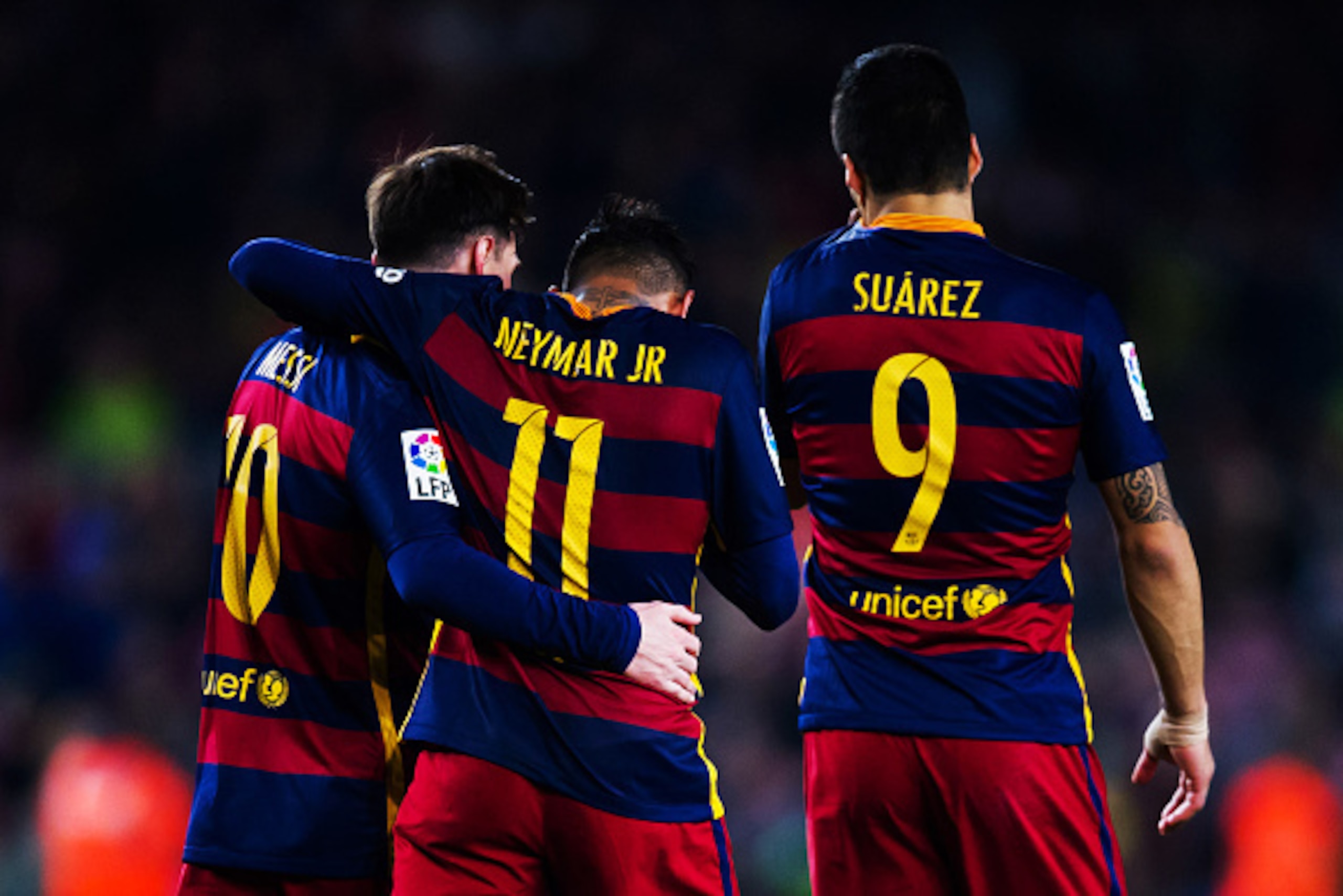 BARCELONA, SPAIN - APRIL 23:  Neymar Santos Jr of FC Barcelona is congratulated by his teammates Luis Suarez and Lionel Messi after scoring his team's fifth goal during the La Liga match between FC Barcelona and Sporting Gijon at Camp Nou on April 23, 201