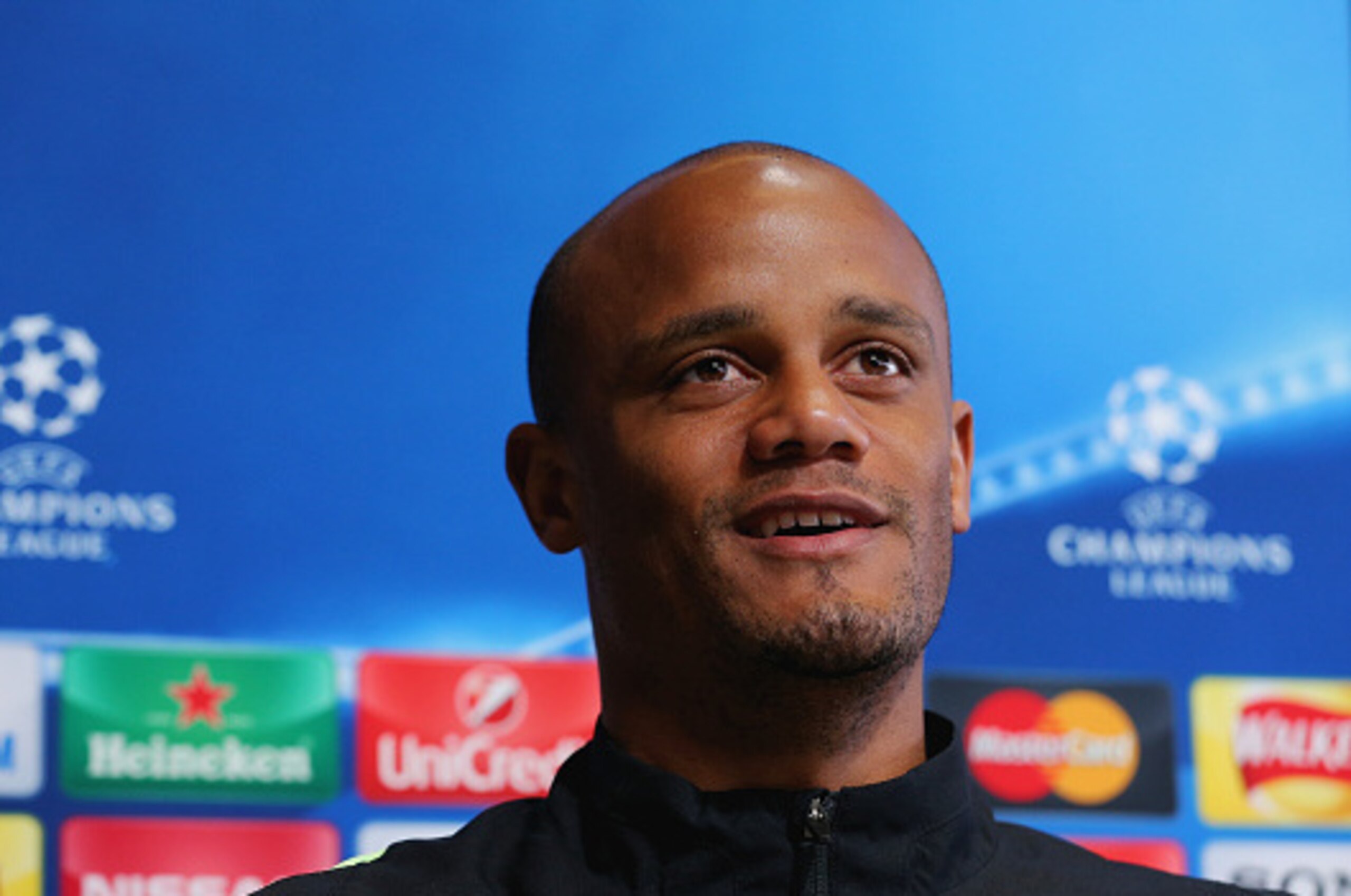 MANCHESTER, ENGLAND - APRIL 25:  Vincent Kompany speaks during a Manchester City press conference on the eve of their UEFA Champions League semi final first leg match against Real Madrid at the Academy training ground on April 25, 2016 in Manchester, Unit