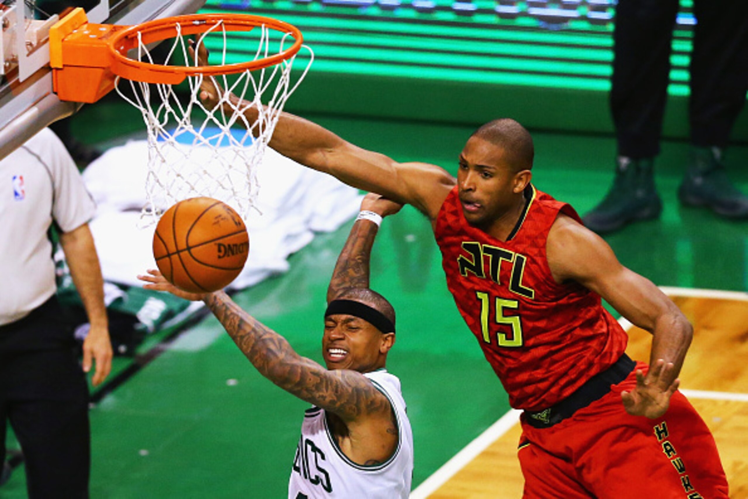 BOSTON, MA - APRIL 24:  Al Horford #15 of the Atlanta Hawks defends a shot by Isaiah Thomas #4 of the Boston Celtics during the fourth quarter of Game Four of the Eastern Conference Quarterfinals during the 2016 NBA Playoffs at TD Garden on April 24, 2016