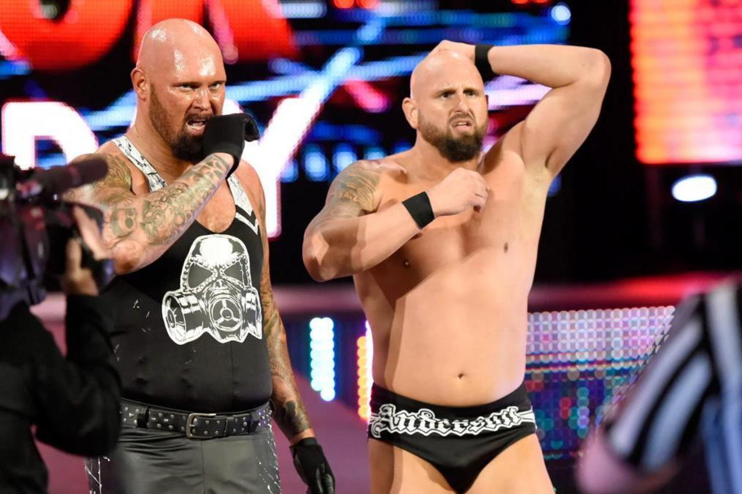 Luke Gallows and Karl Anderson are left reeling after a run-in with Roman Reigns.
