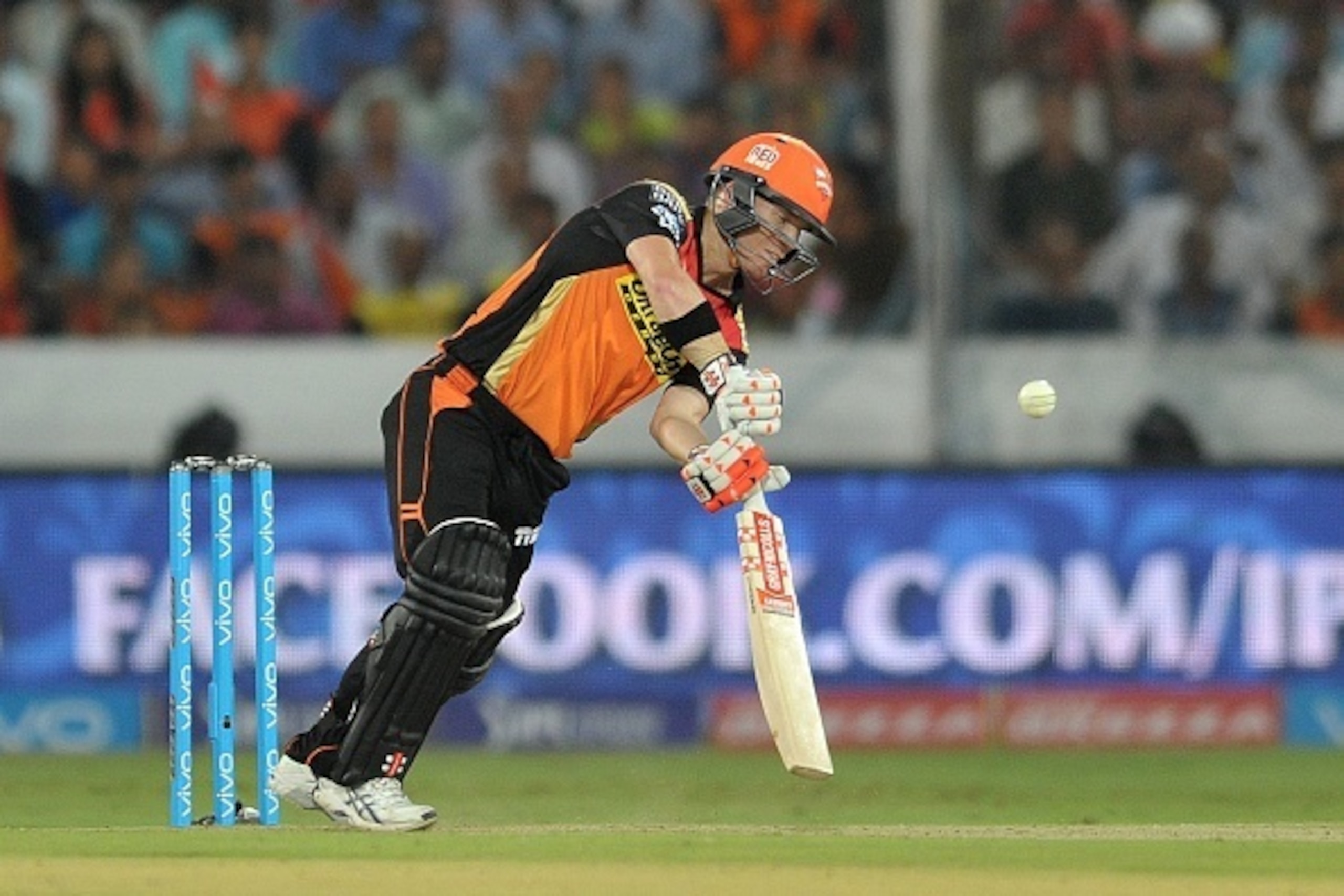 Sunrisers Hyderabad captain David Warner plays a shot during the 2016 Indian Premier League (IPL) Twenty20 cricket match between Sunrisers Hyderabad and Mumbai Indians at The Rajiv Gandhi International Stadium in Hyderabad on April 18, 2016. / AFP / NOAH 