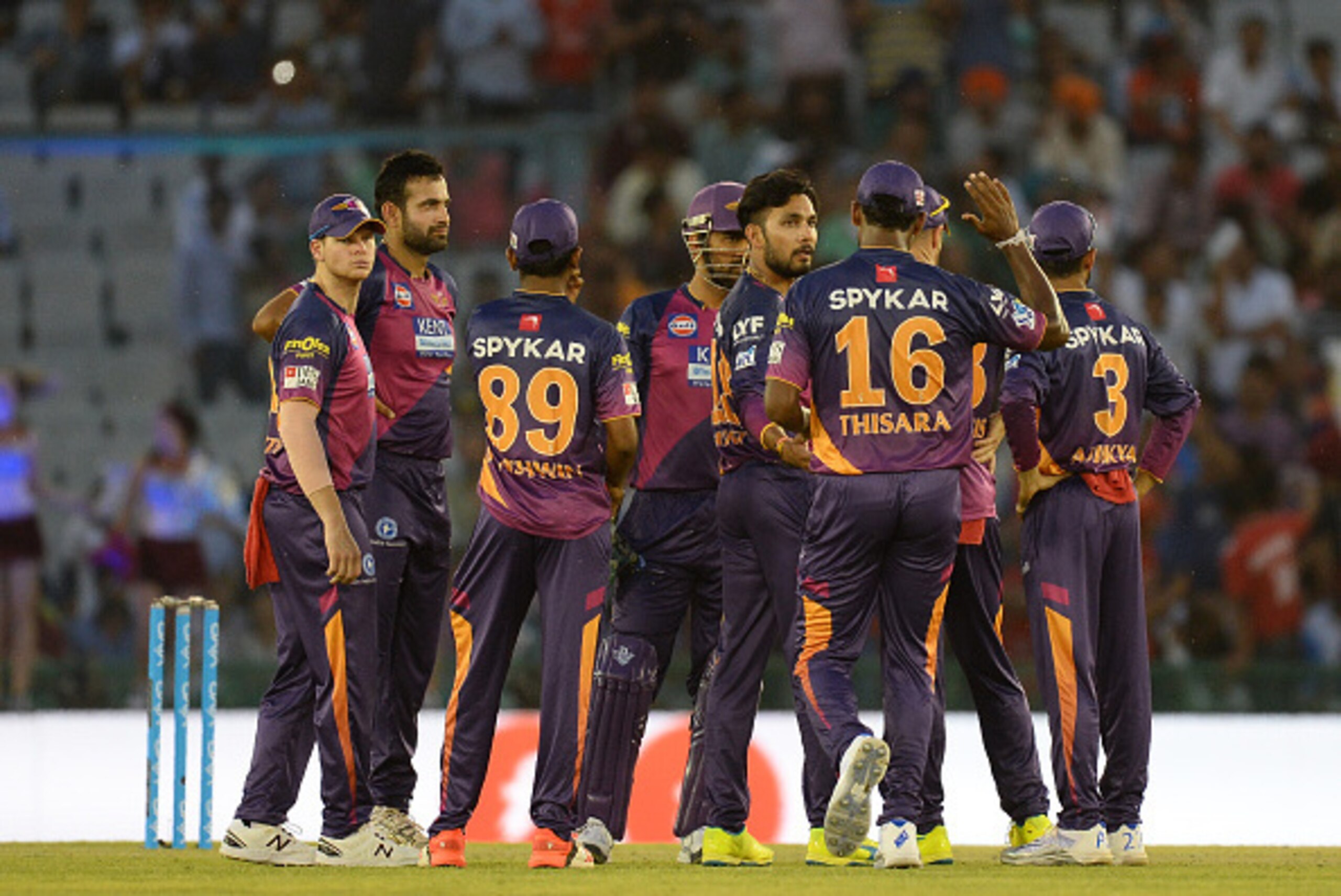 Rising Pune Supergiants players celebrate the dismissal of Kings XI Punjab batsman Manan Vohra during the 2016 Indian Premier League (IPL) Twenty20 cricket match between Rising Pune Supergiants and Kings XI Punjab at The Punjab Cricket Association Stadium