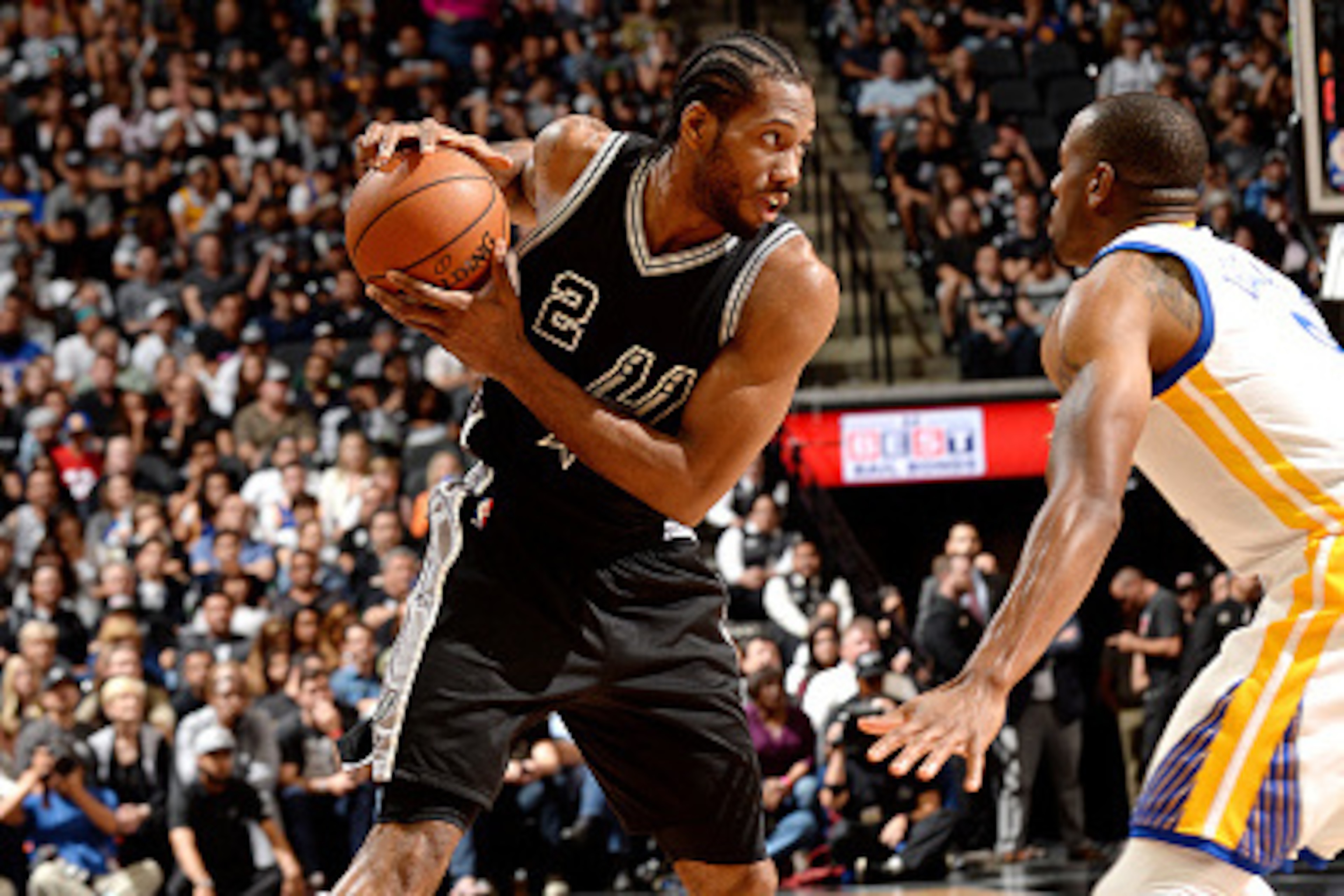 SAN ANTONIO, TX - APRIL 10: Kawhi Leonard #2 of the San Antonio Spurs handles the ball during the game against the Golden State Warriors on April 10, 2016 at the AT&T Center in San Antonio, Texas. NOTE TO USER: User expressly acknowledges and agrees that, SAN ANTONIO, TX - APRIL 10: Kawhi Leonard #2 of the San Antonio Spurs handles the ball during the game against the Golden State Warriors on April 10, 2016 at the AT&T Center in San Antonio, Texas. NOTE TO USER: User expressly acknowledges and agrees that,