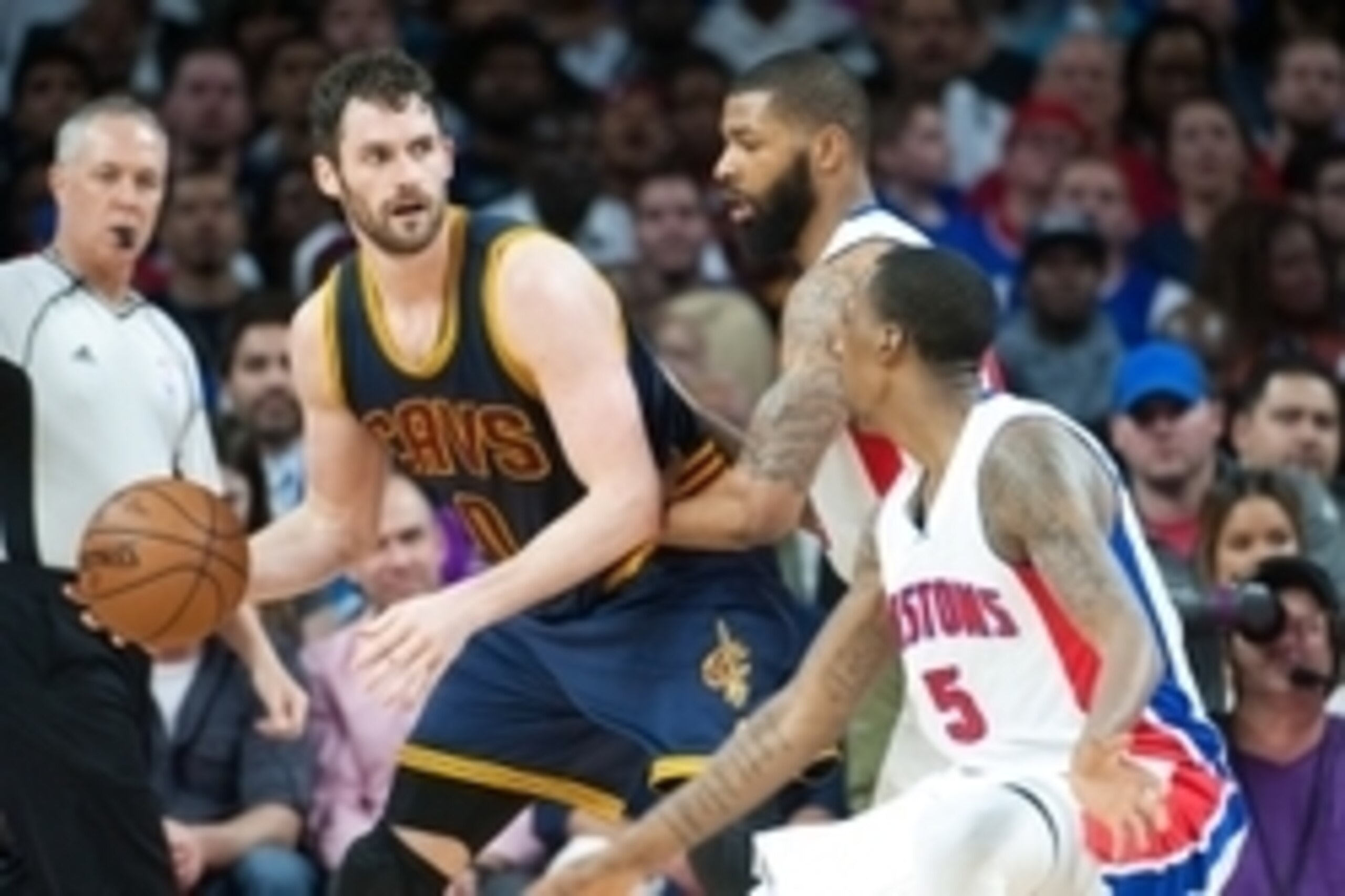 Apr 22, 2016; Auburn Hills, MI, USA; Cleveland Cavaliers forward Kevin Love (0) backs down Detroit Pistons forward Marcus Morris (13) during game three of the first round of the NBA Playoffs at The Palace of Auburn Hills. Mandatory Credit: Tim Fuller-USA 