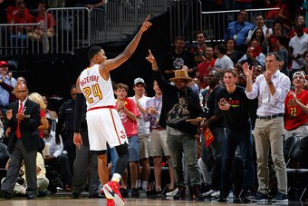 ATLANTA, GA - APRIL 26:  Kent Bazemore #24 of the Atlanta Hawks reacts after hitting his third consecutive three-point basket against the Boston Celtics in Game Five of the Eastern Conference Quarterfinals during the 2016 NBA Playoffs at Philips Arena on 