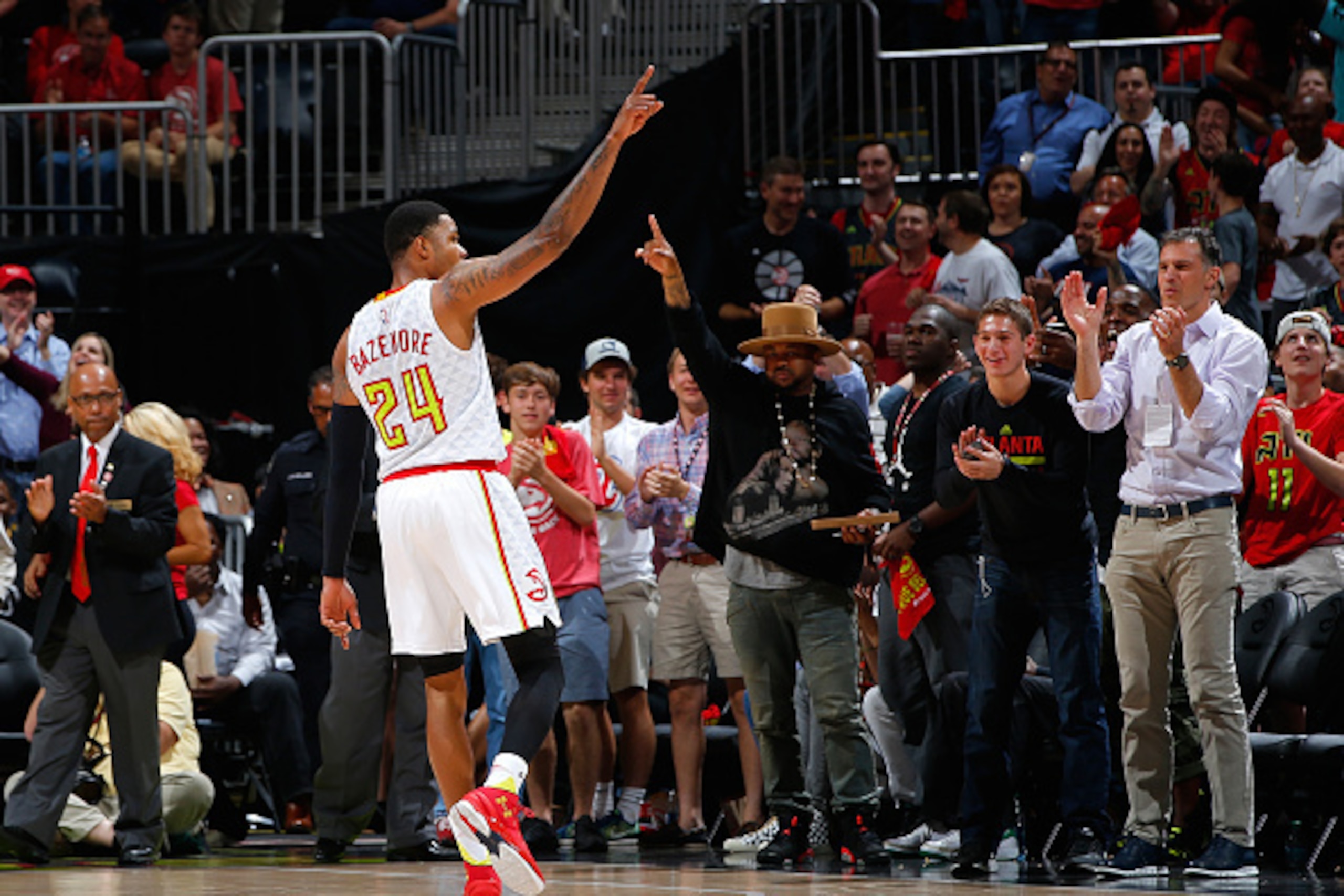ATLANTA, GA - APRIL 26:  Kent Bazemore #24 of the Atlanta Hawks reacts after hitting his third consecutive three-point basket against the Boston Celtics in Game Five of the Eastern Conference Quarterfinals during the 2016 NBA Playoffs at Philips Arena on 