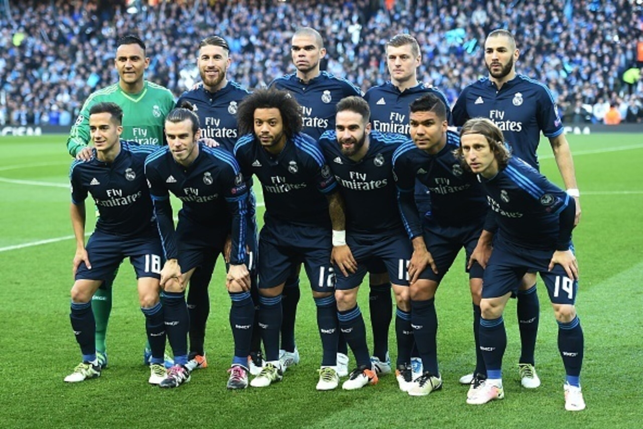 The Real Madrid starting XI, (L-R top row) Real Madrid's Costa Rican goalkeeper Keylor Navas, Real Madrid's defender Sergio Ramos, Real Madrid's Portuguese defender Pepe, Real Madrid's German midfielder Toni Kroos and Real Madrid's French forward Karim Be