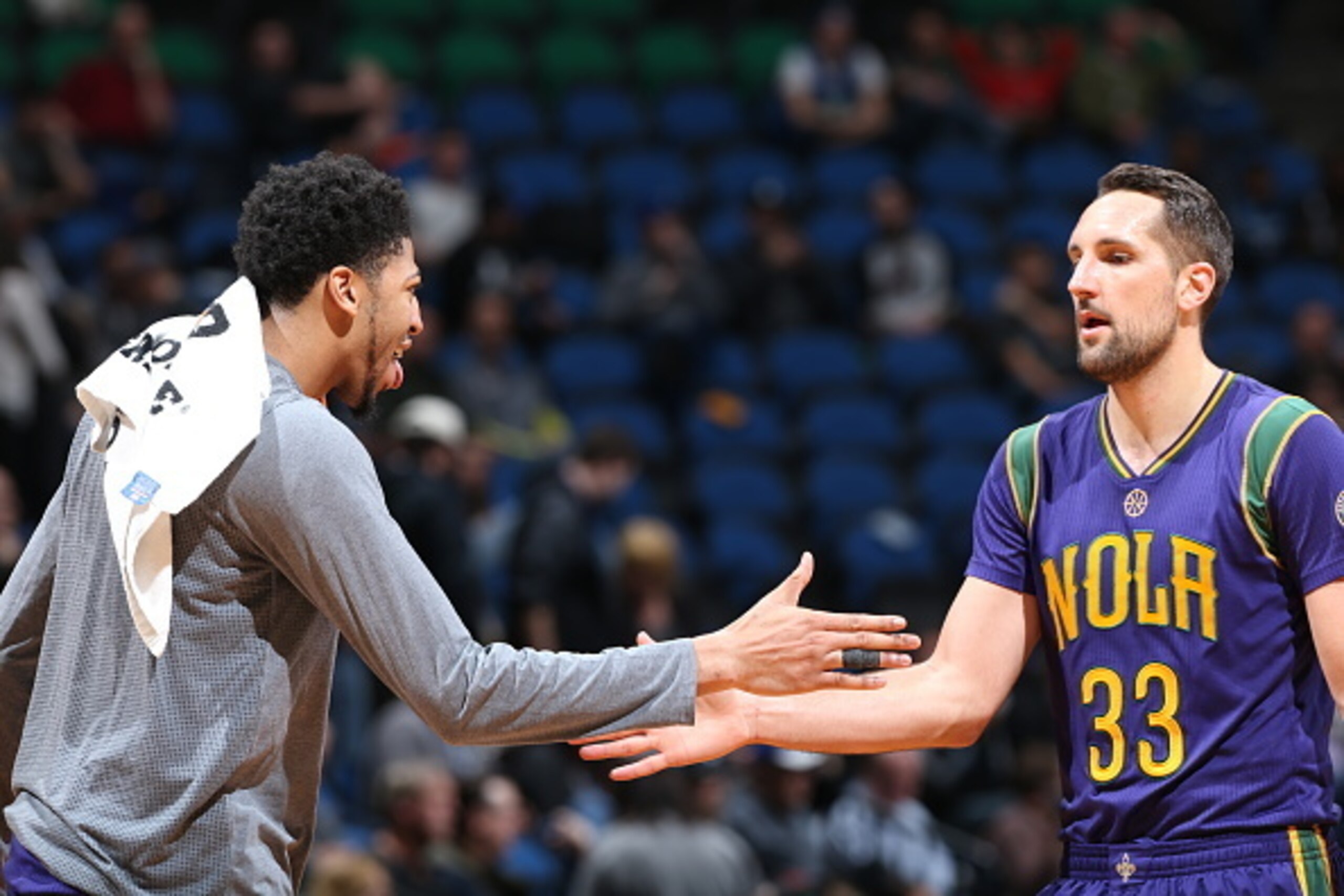 MINNEAPOLIS, MN - FEBRUARY 8: Anthony Davis #23 high fives teammate Ryan Anderson #33 of the New Orleans Pelicans during the game against the Minnesota Timberwolves on February 8, 2016 at Target Center in Minneapolis, Minnesota. NOTE TO USER: User express