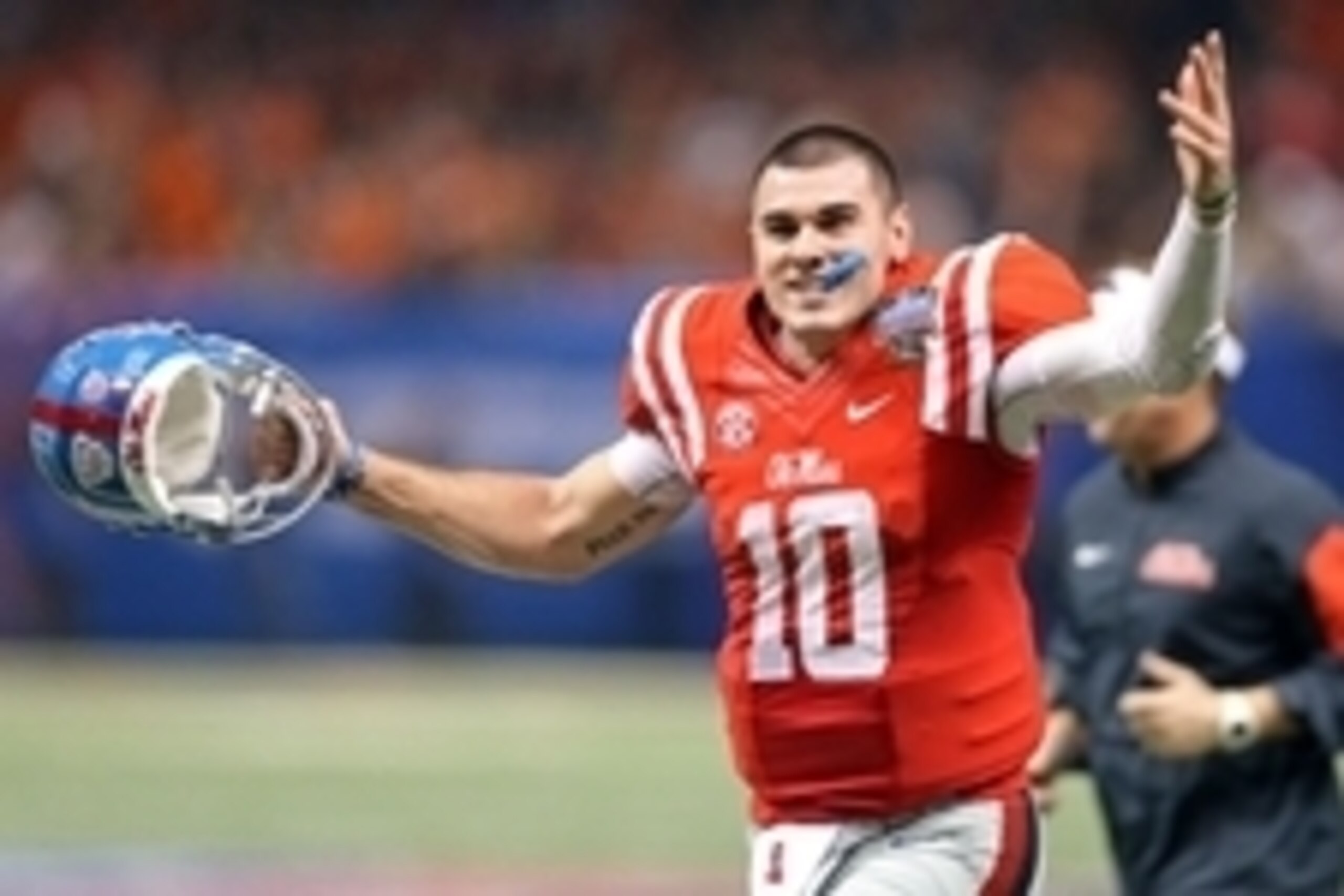 Jan 1, 2016; New Orleans, LA, USA; Mississippi Rebels quarterback Chad Kelly (10) gestures while running off the field at the end of the the second quarter against the Oklahoma State Cowboys in the 2016 Sugar Bowl at the Mercedes-Benz Superdome. Mandatory