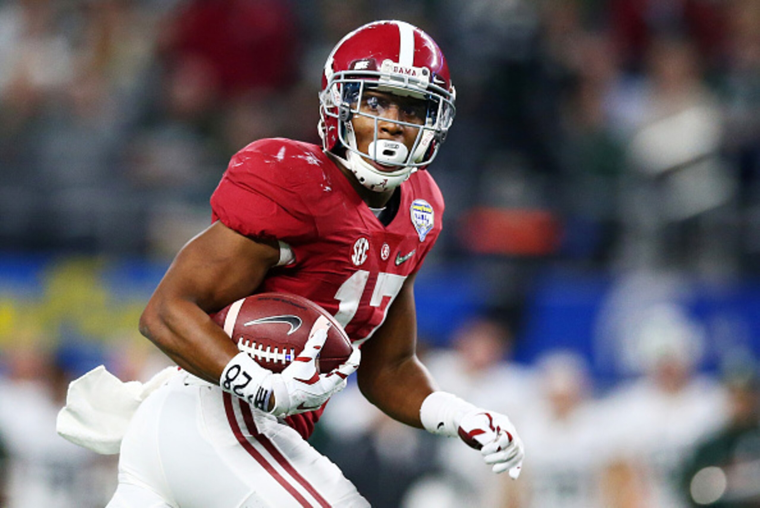 ARLINGTON, TX - DECEMBER 31:  Running back Kenyan Drake #17 of the Alabama Crimson Tide runs for 58-yards in the fourth quarter against the Michigan State Spartans during the Goodyear Cotton Bowl at AT&T Stadium on December 31, 2015 in Arlington, Texas.