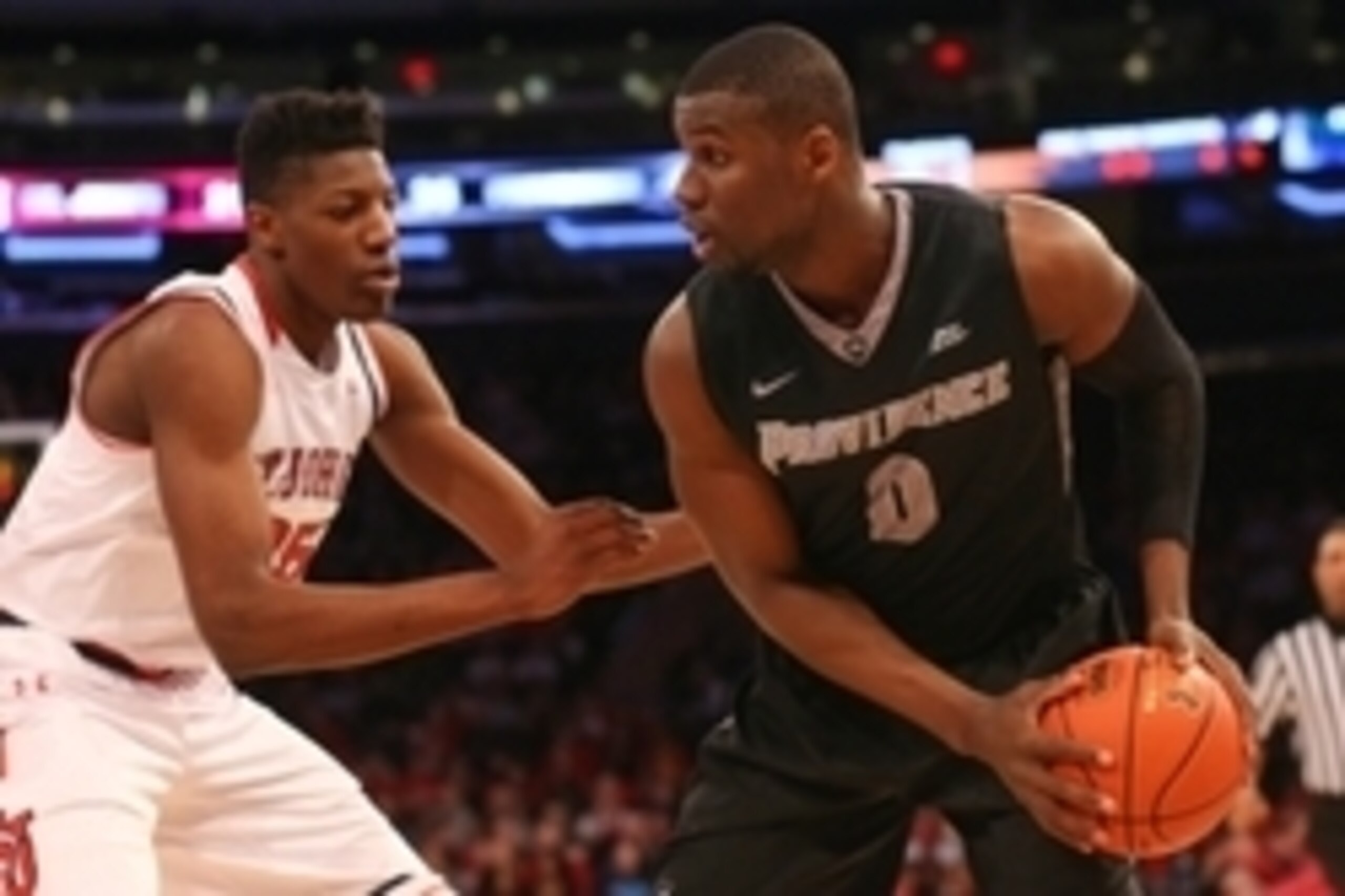 Mar 5, 2016; Queens, NY, USA; Providence Friars forward Ben Bentil (0) dribbles the ball as St. John's Red Storm center Yankuba Sima (35) defends during the first half at Madison Square Garden. Mandatory Credit: Anthony Gruppuso-USA TODAY Sports