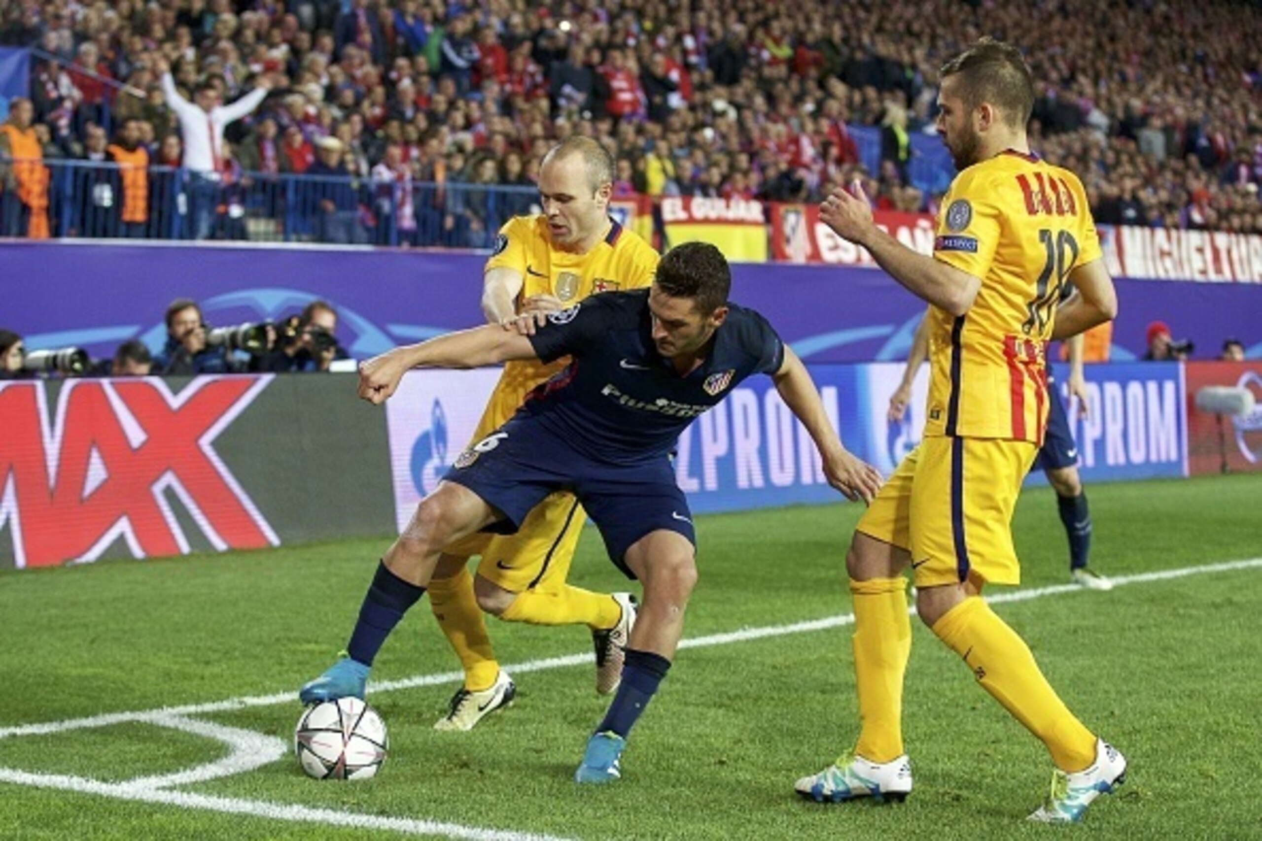 (L-R) Andres Iniesta of FC Barcelona, Koke of Club Atletico de Madrid, Jordi Alba of FC Barcelona during the UEFA Champions League quarter-final match between  Atletico Madrid and FC Barcelona on April 13, 2016 at the Vicente Calderon stadium in Madrid, S