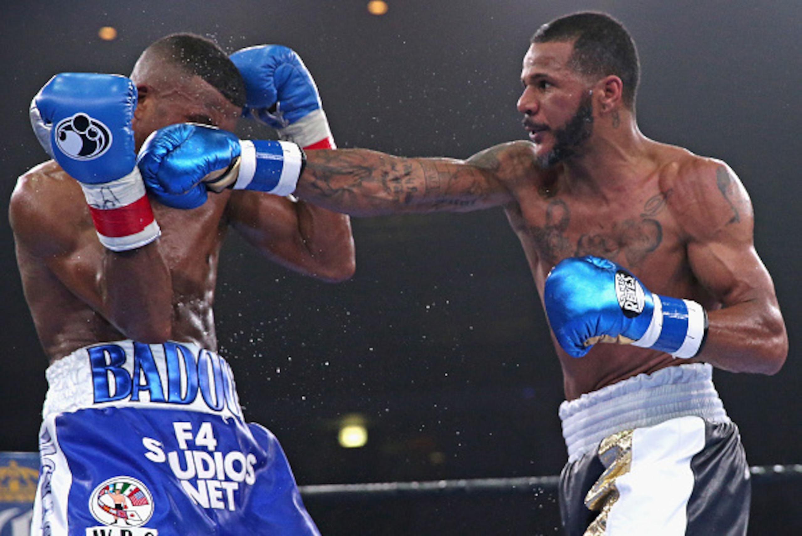 CHICAGO, IL - APRIL 24:  Anthony Dirrell connects with Badou Jack during a super middleweight fight at the UIC Pavilion on April 24, 2015 in Chicago, Illinois.  (Photo by Jonathan Daniel/Getty Images)