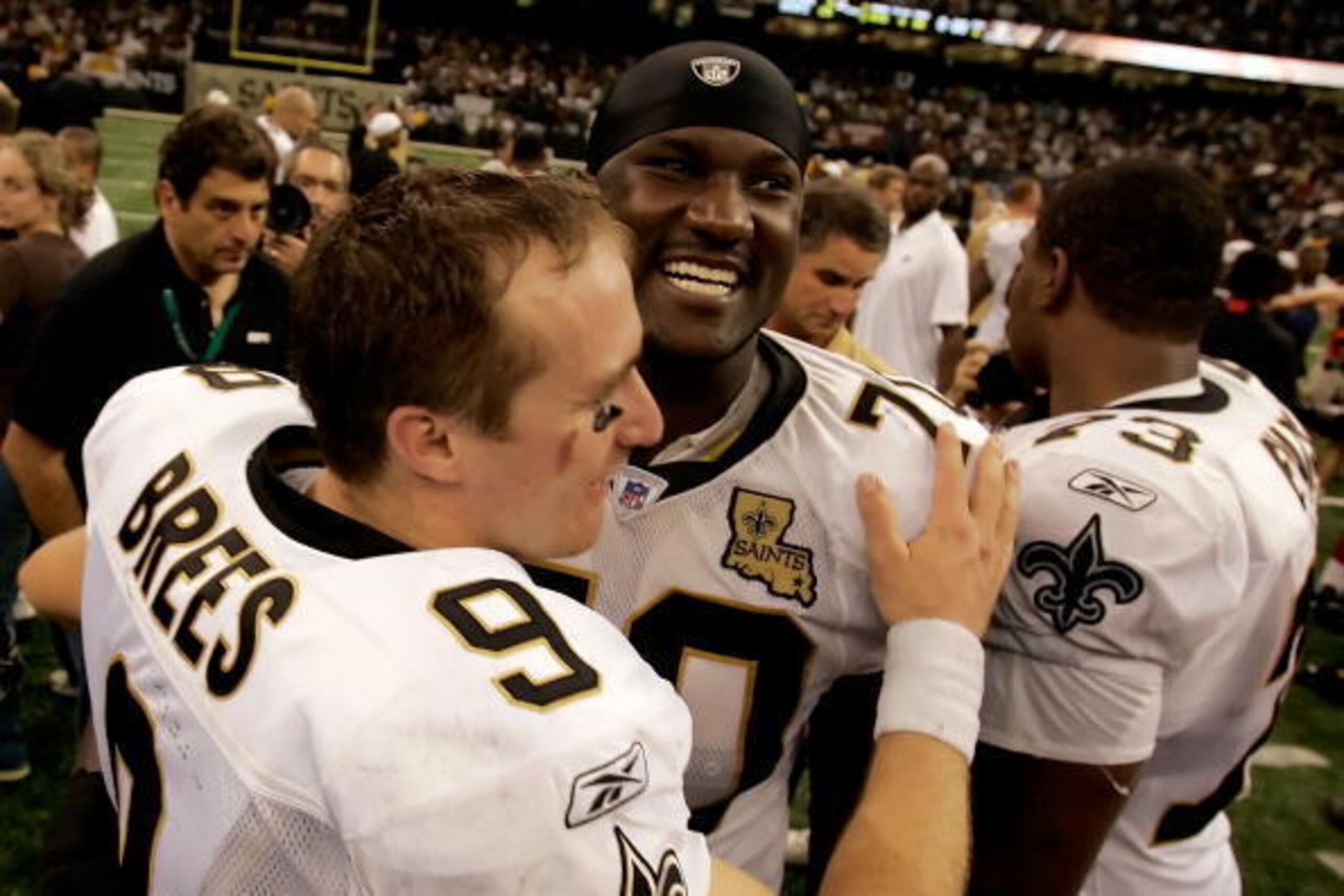 NEW ORLEANS - SEPTEMBER 25:  Quarterback Drew Brees #9 of the New Orleans Saints celebrates with teammate Jammal Brown #70 after their team's 23-3 victory over the Atlanta Falcons in the Monday Night Football game on September 25, 2006 at the Superdome in